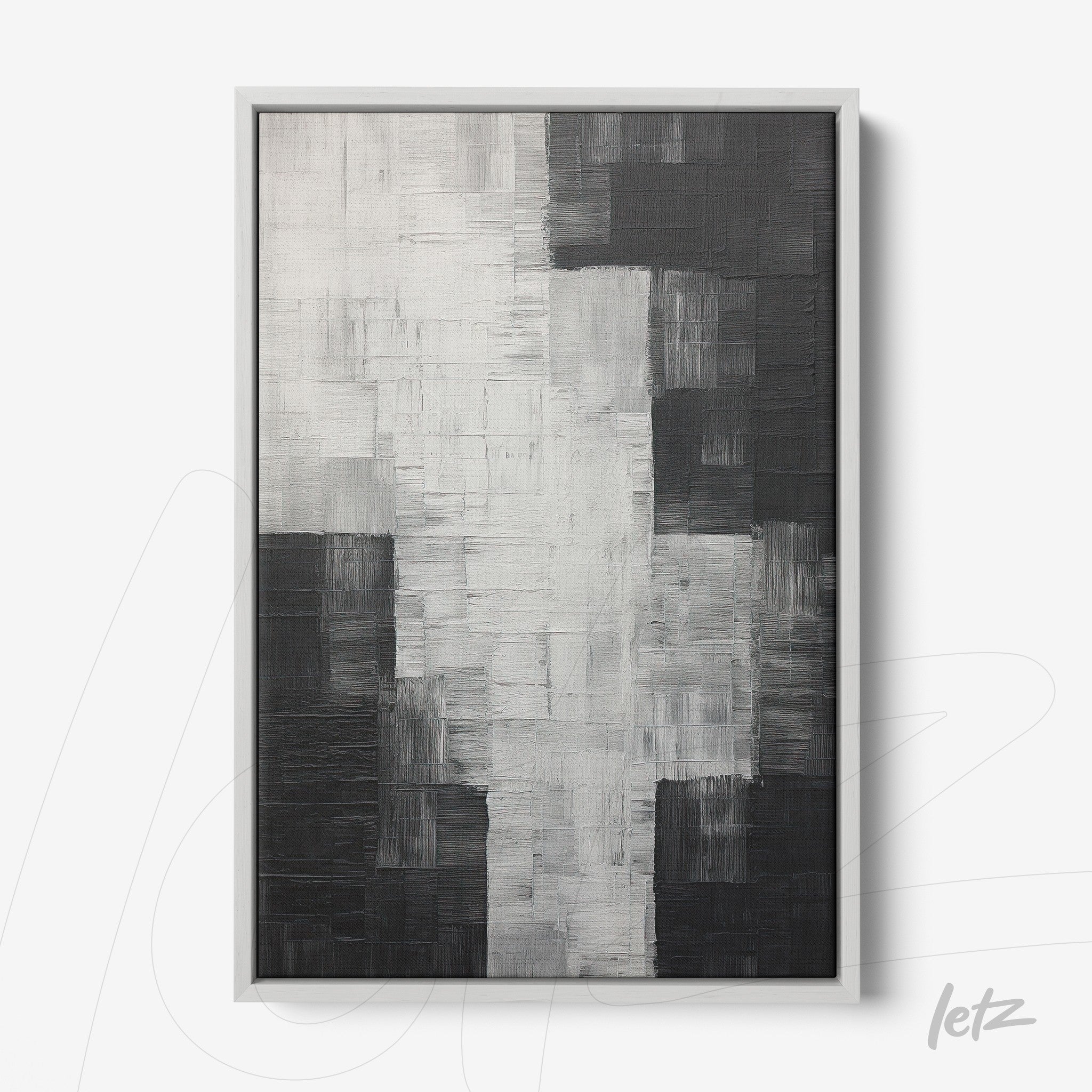 abstract artwork with texture in black, white, and gray tones in silver frame