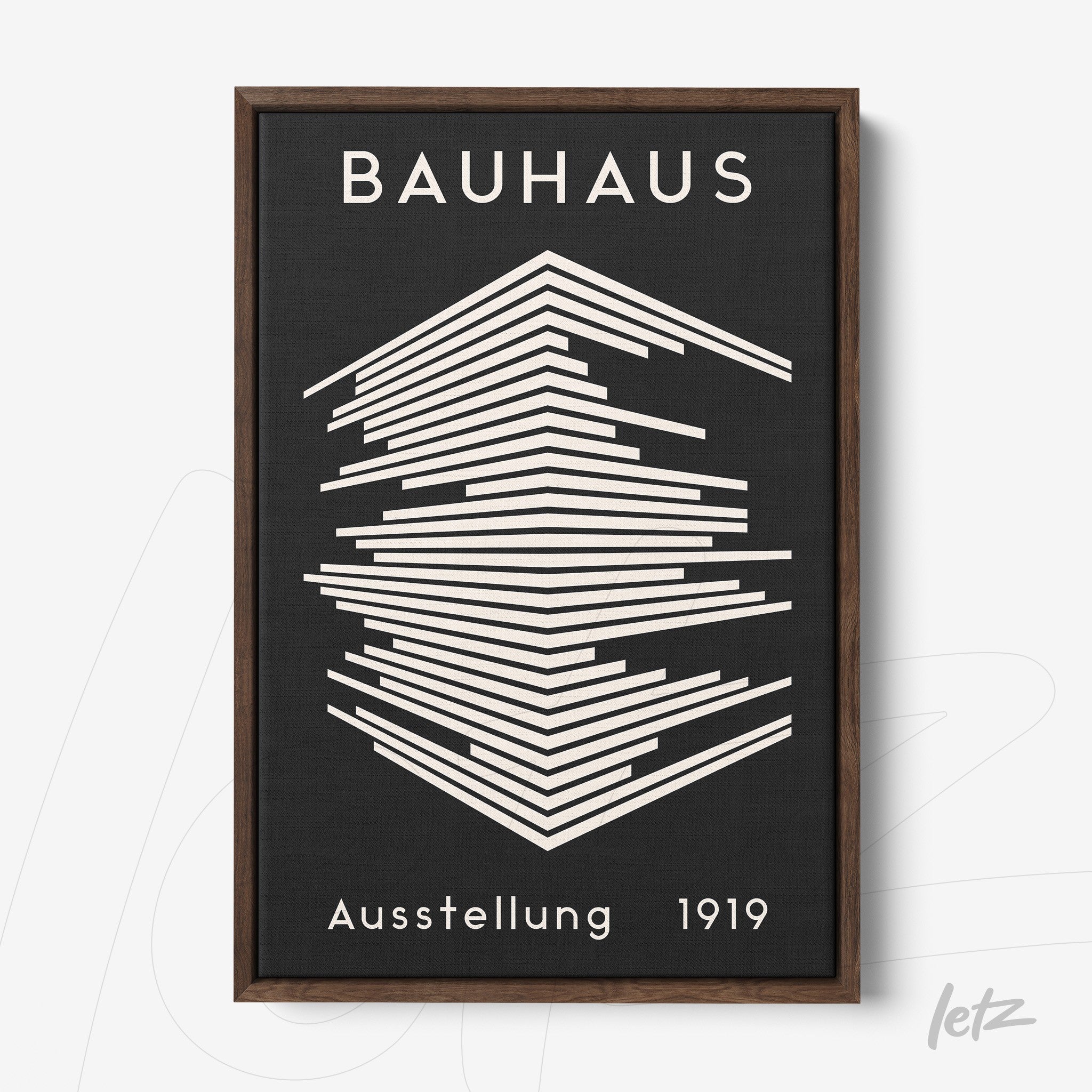 bauhaus style artwork with geometric black and white design, dark wood frame