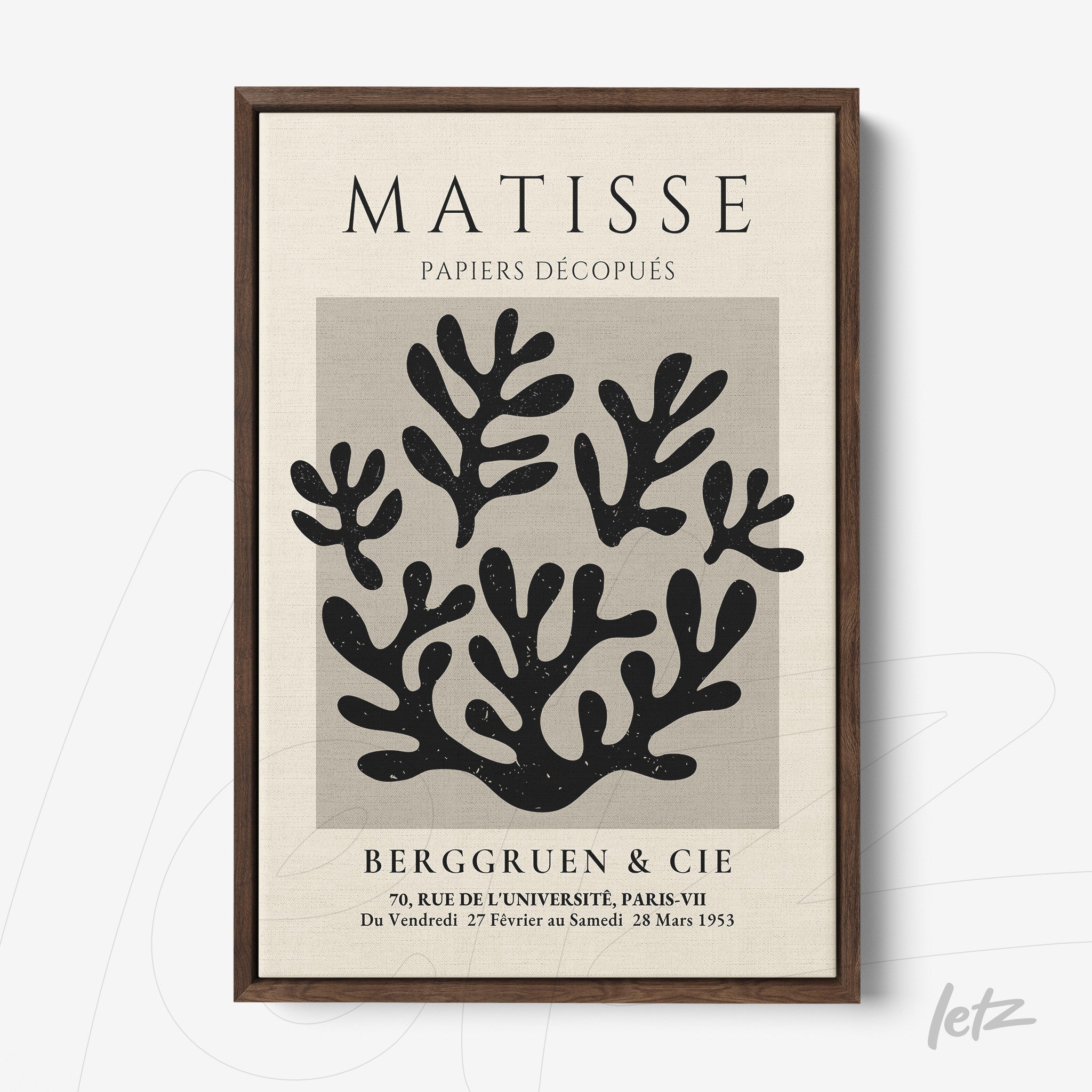 framed artwork featuring abstract organic shapes in dark wood frame