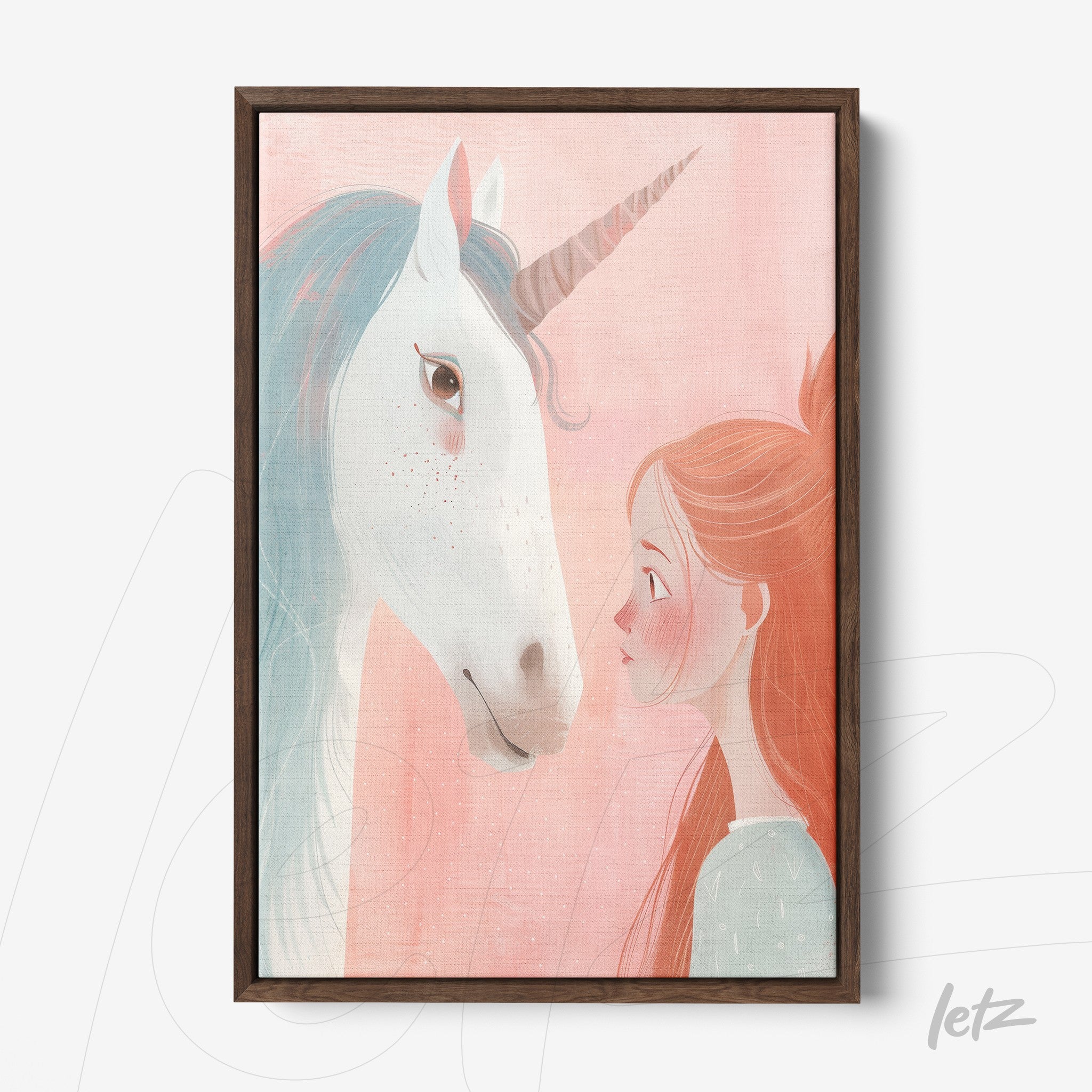 framed decorative art featuring a girl gazing at a unicorn on a soft pink background with a dark wooden frame