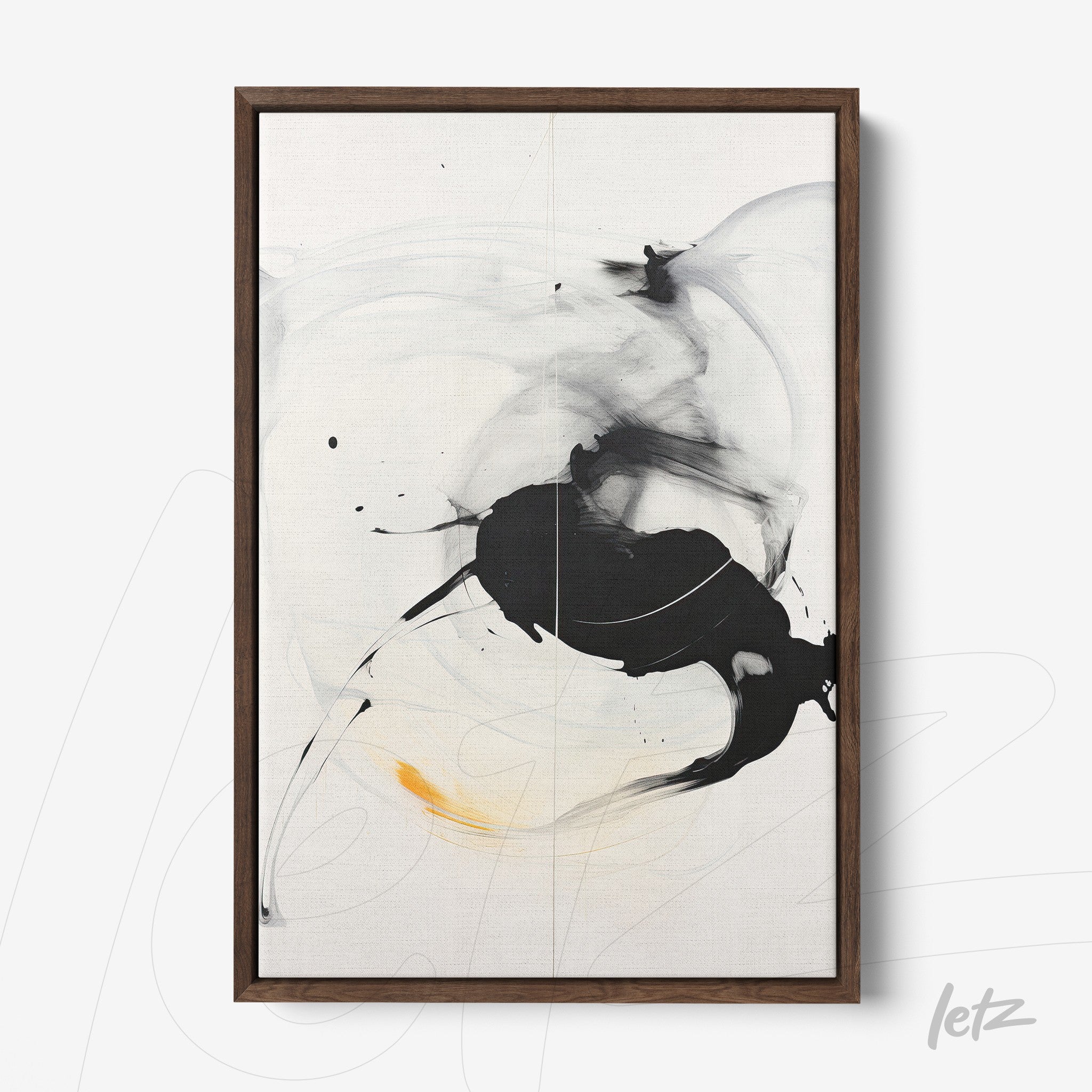 canvas wall art featuring abstract black and white design with a hint of yellow, framed in dark wood