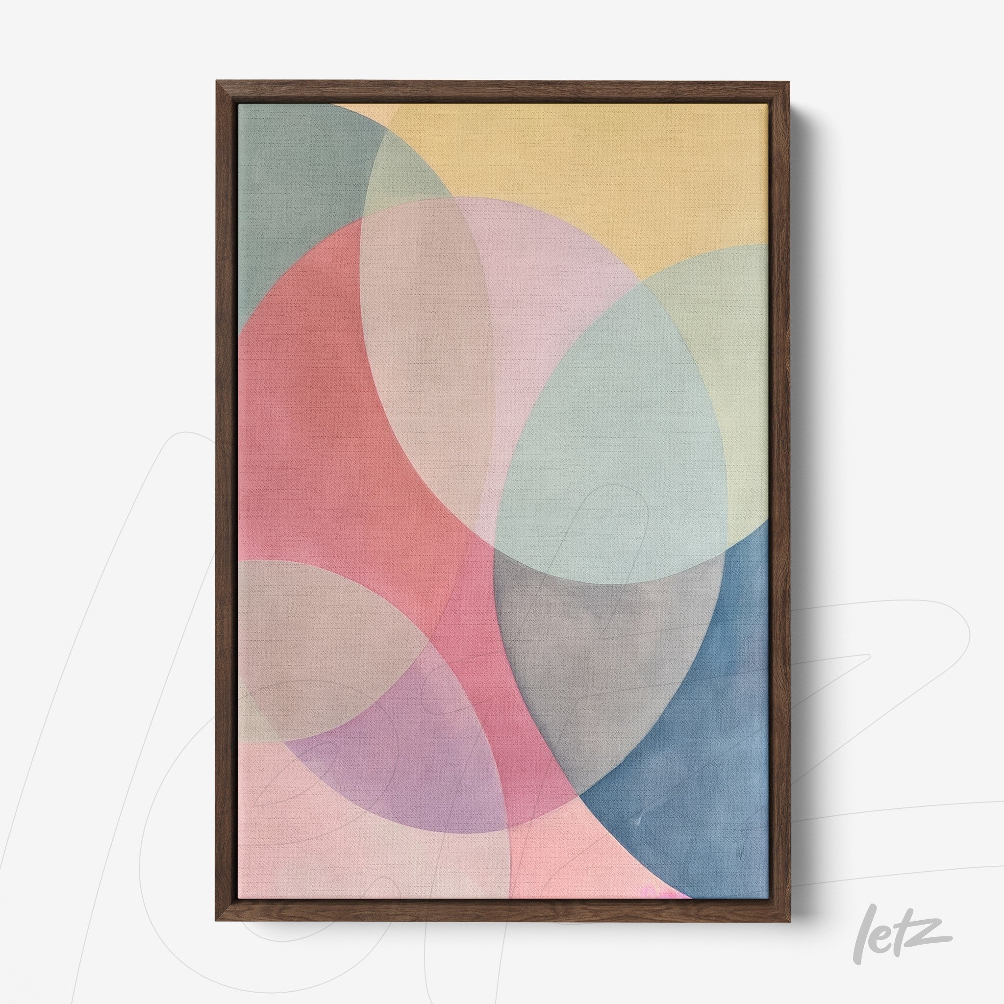 framed artwork featuring a geometric composition in pastel shades of pink, blue, and yellow with a dark wood frame