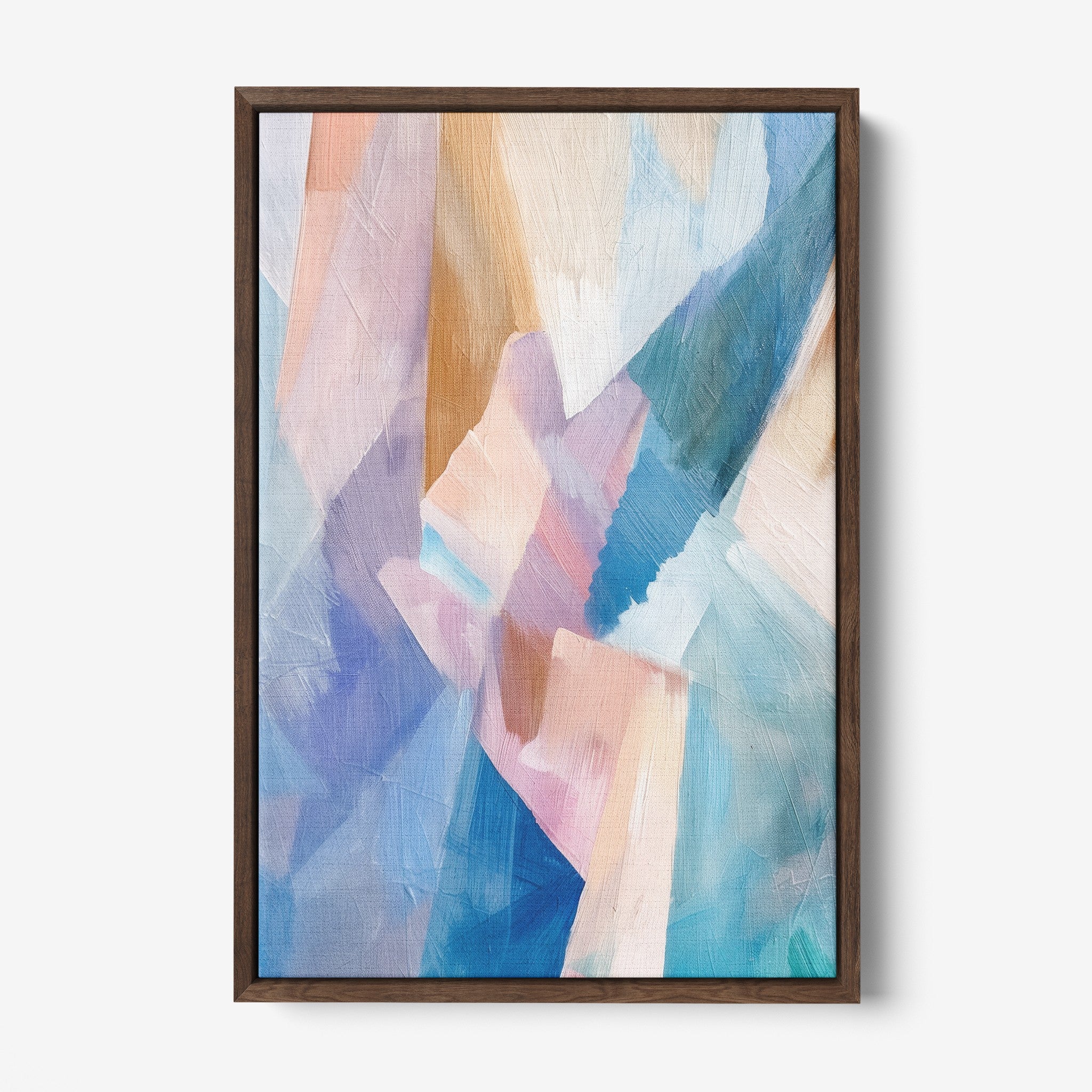 framed canvas artwork featuring abstract shapes in pastel colors with dark wooden frame