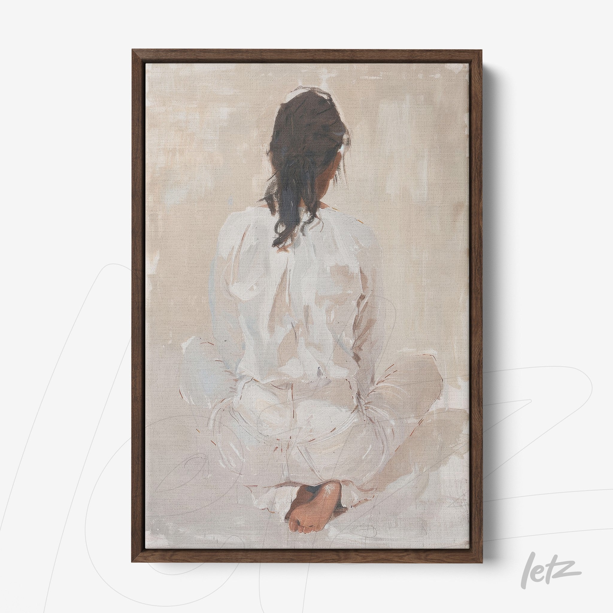framed artwork in neutral tones depicting the back of a seated woman in lotus position with dark wood frame