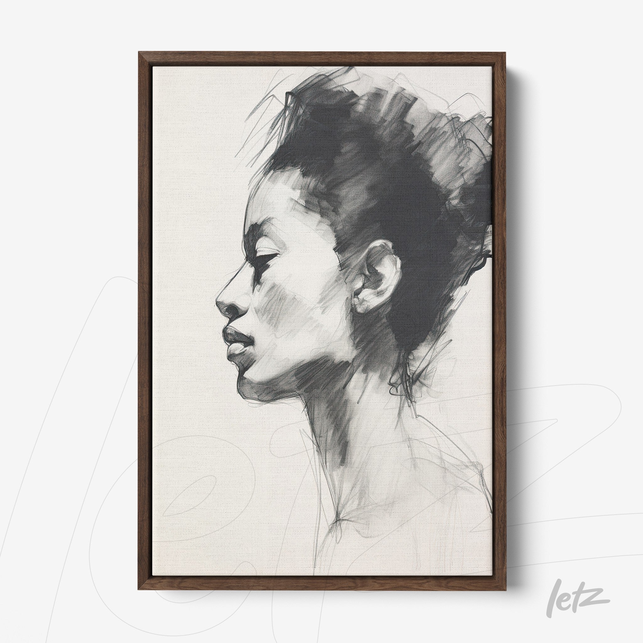 framed wall art featuring a black and white illustration of a woman's profile