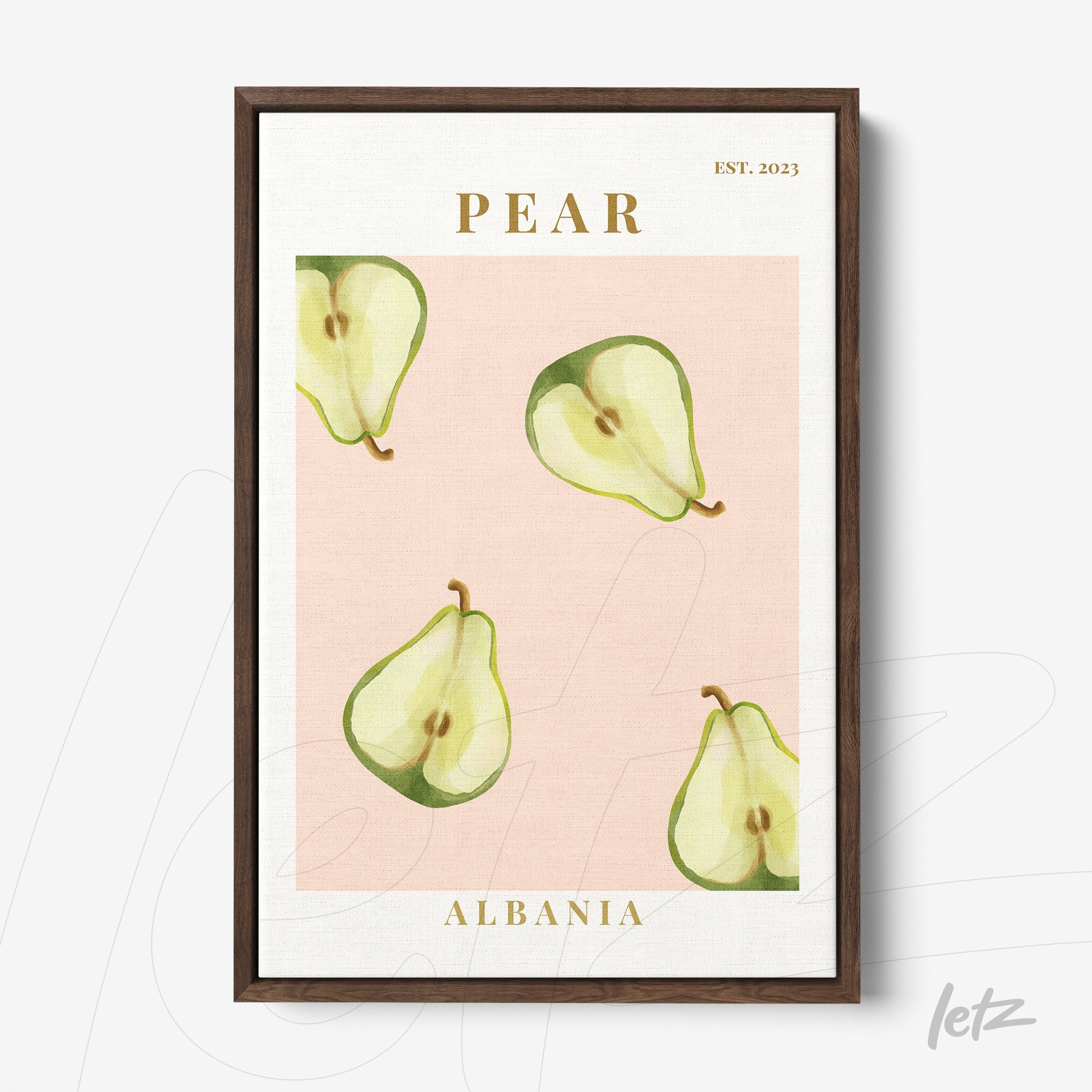 framed art print of pears on pink background with dark wood frame