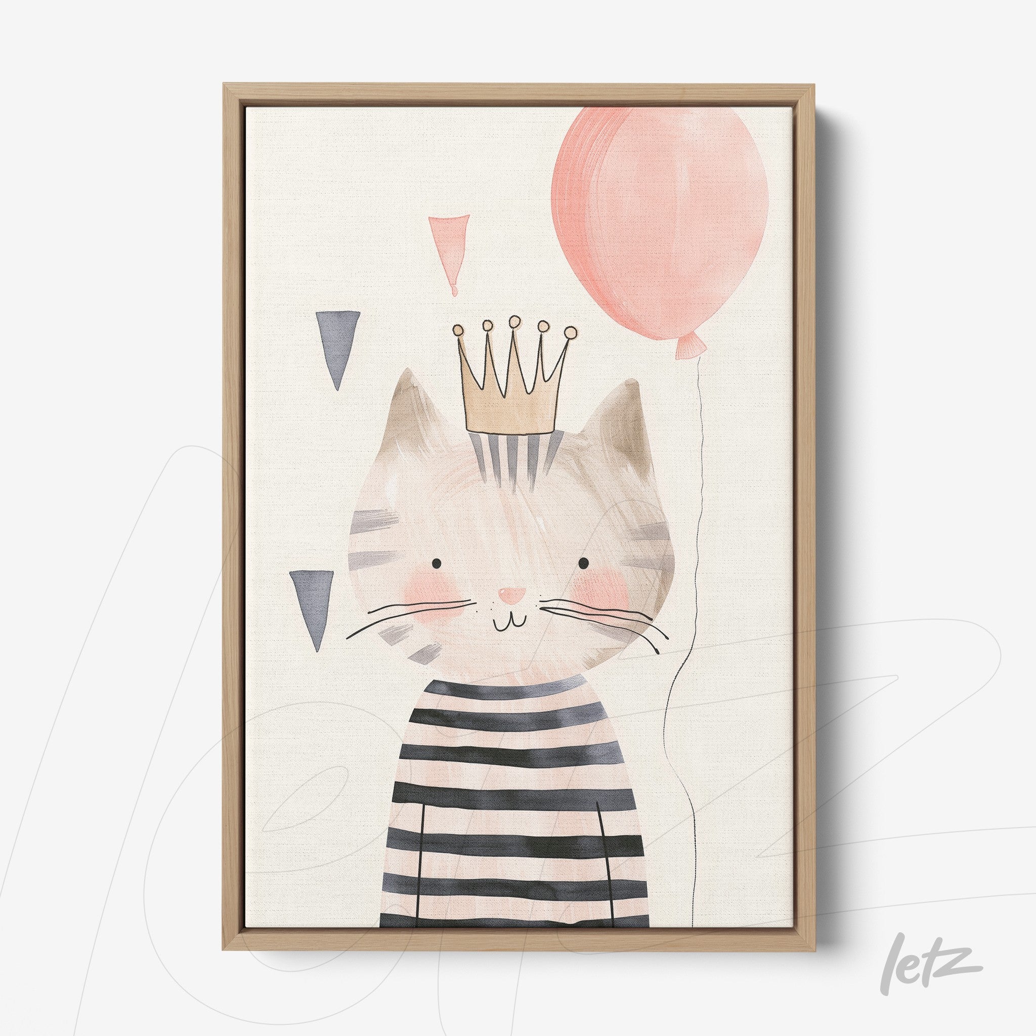 framed artwork of a striped cat wearing a crown and holding a pink balloon in light wood frame