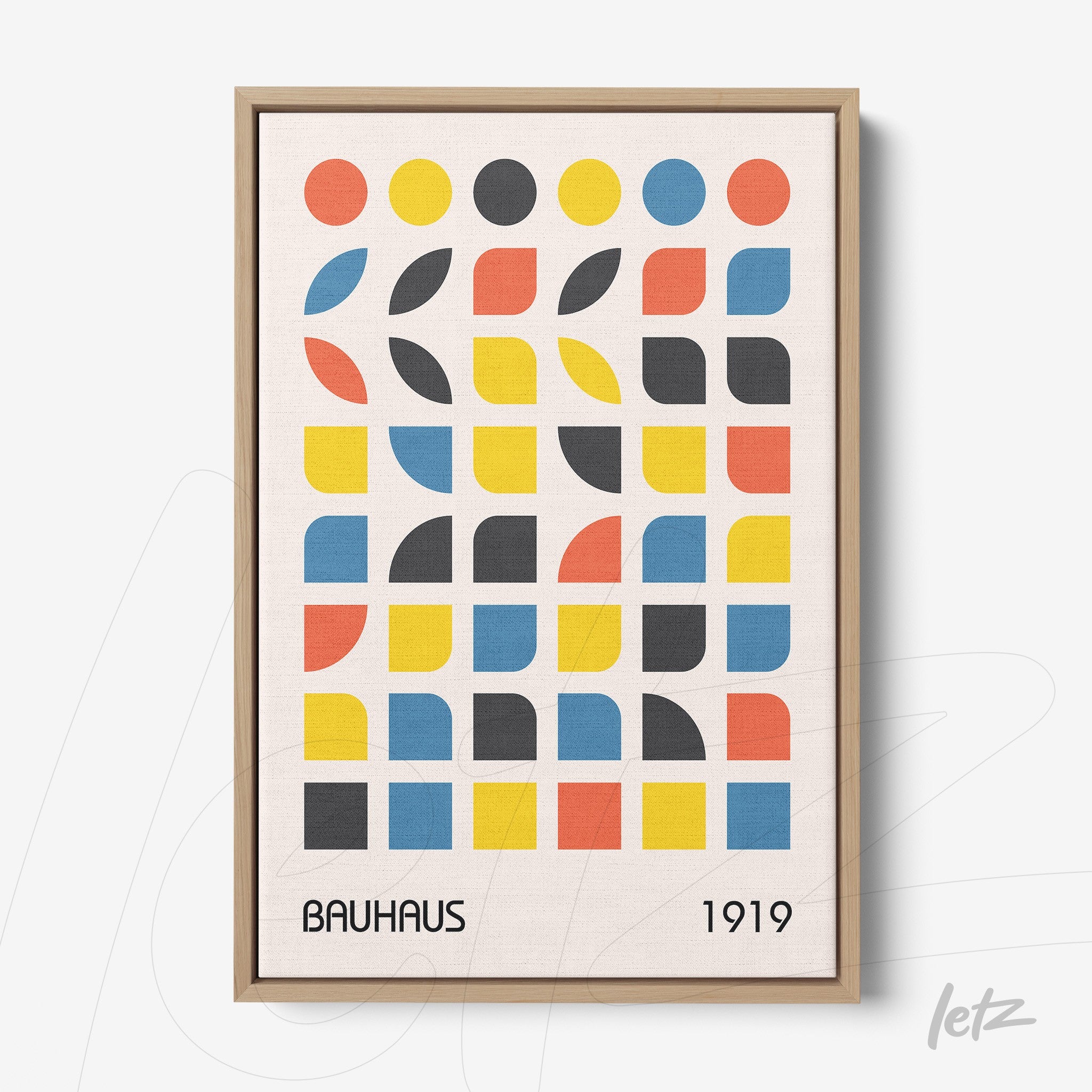 bauhaus-inspired geometric art with colorful shapes in a wooden frame on a light background