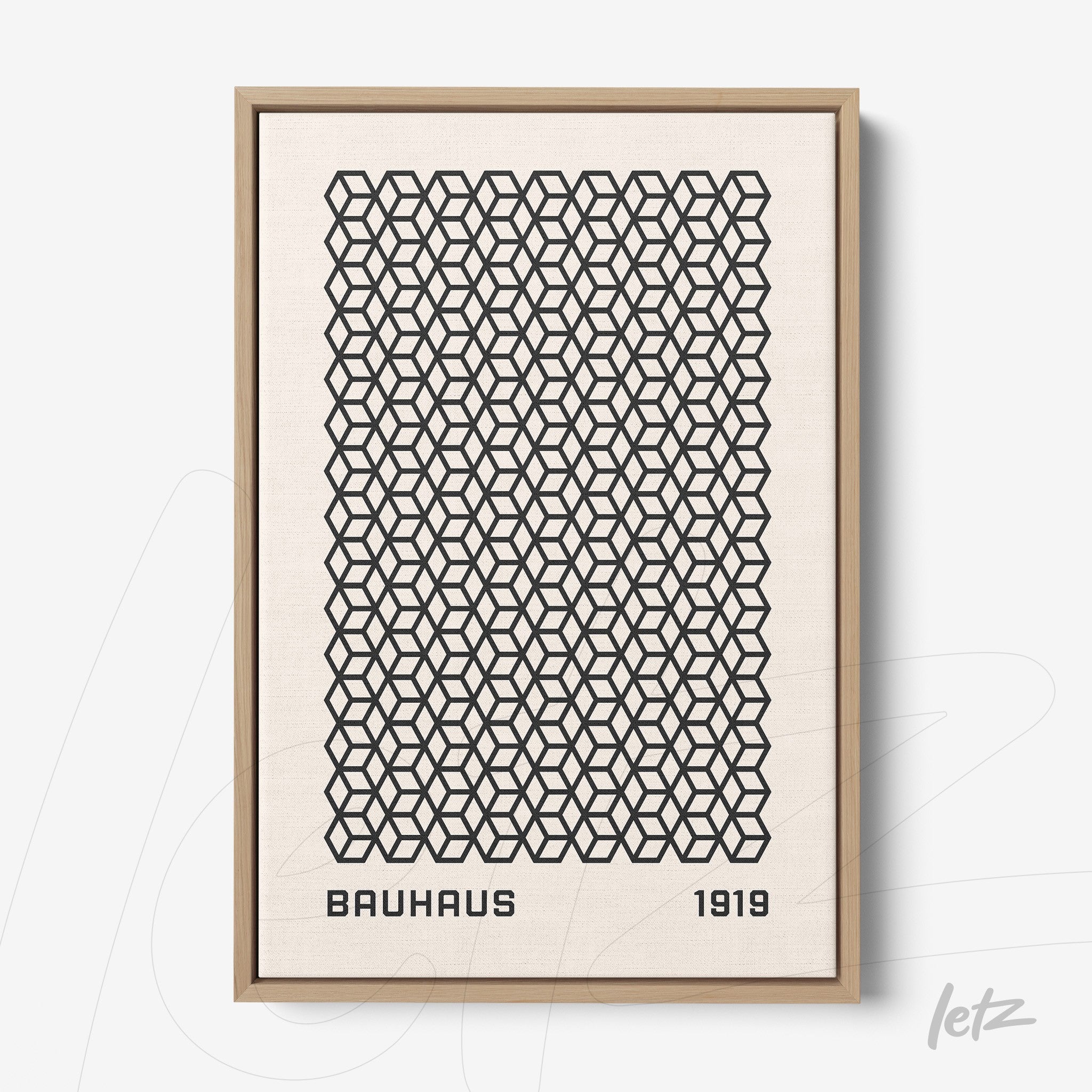 framed print featuring repetitive black geometric patterns with the text bauhaus 1919 at the bottom in light wood frame