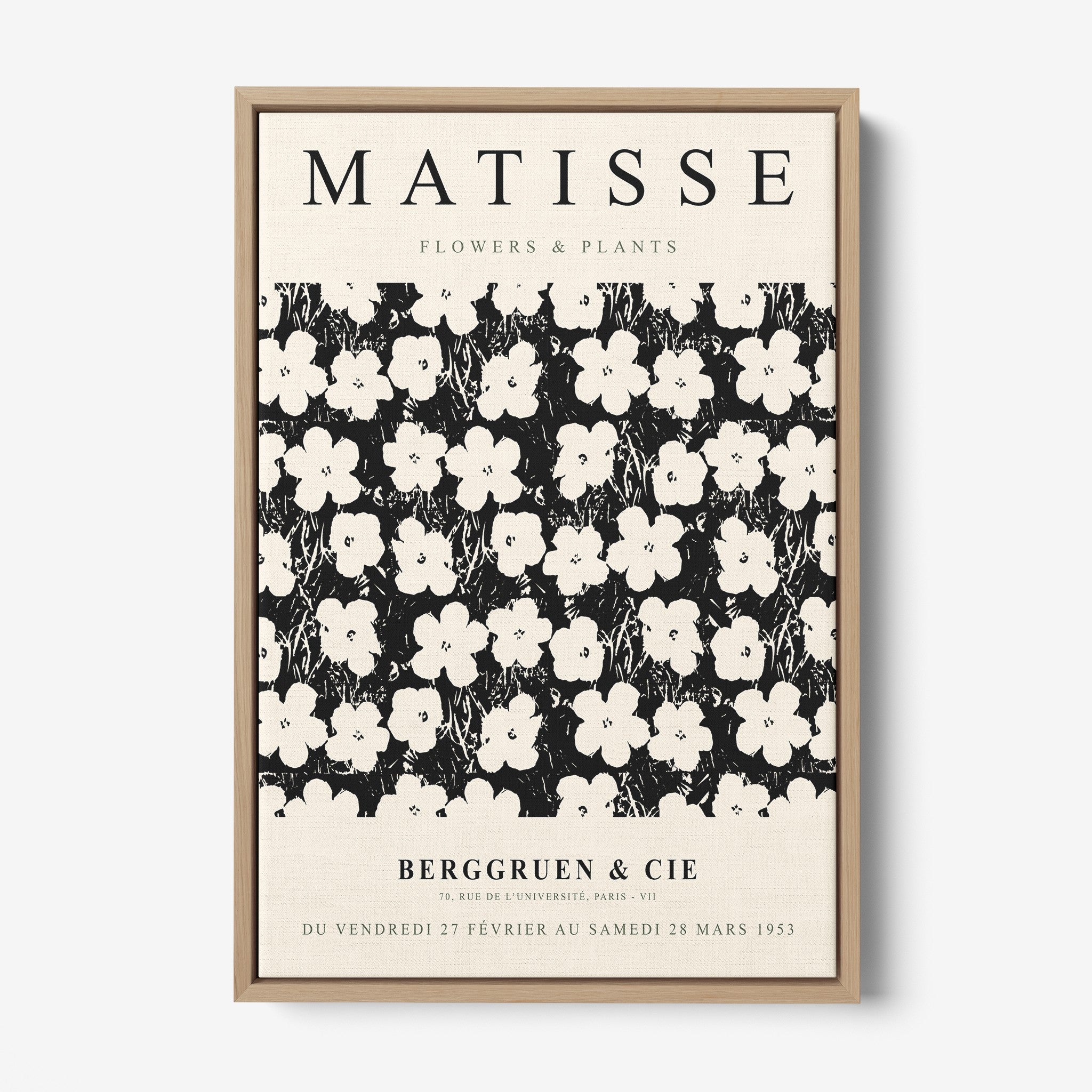 vintage style framed artwork featuring white flowers on black background with light wood frame