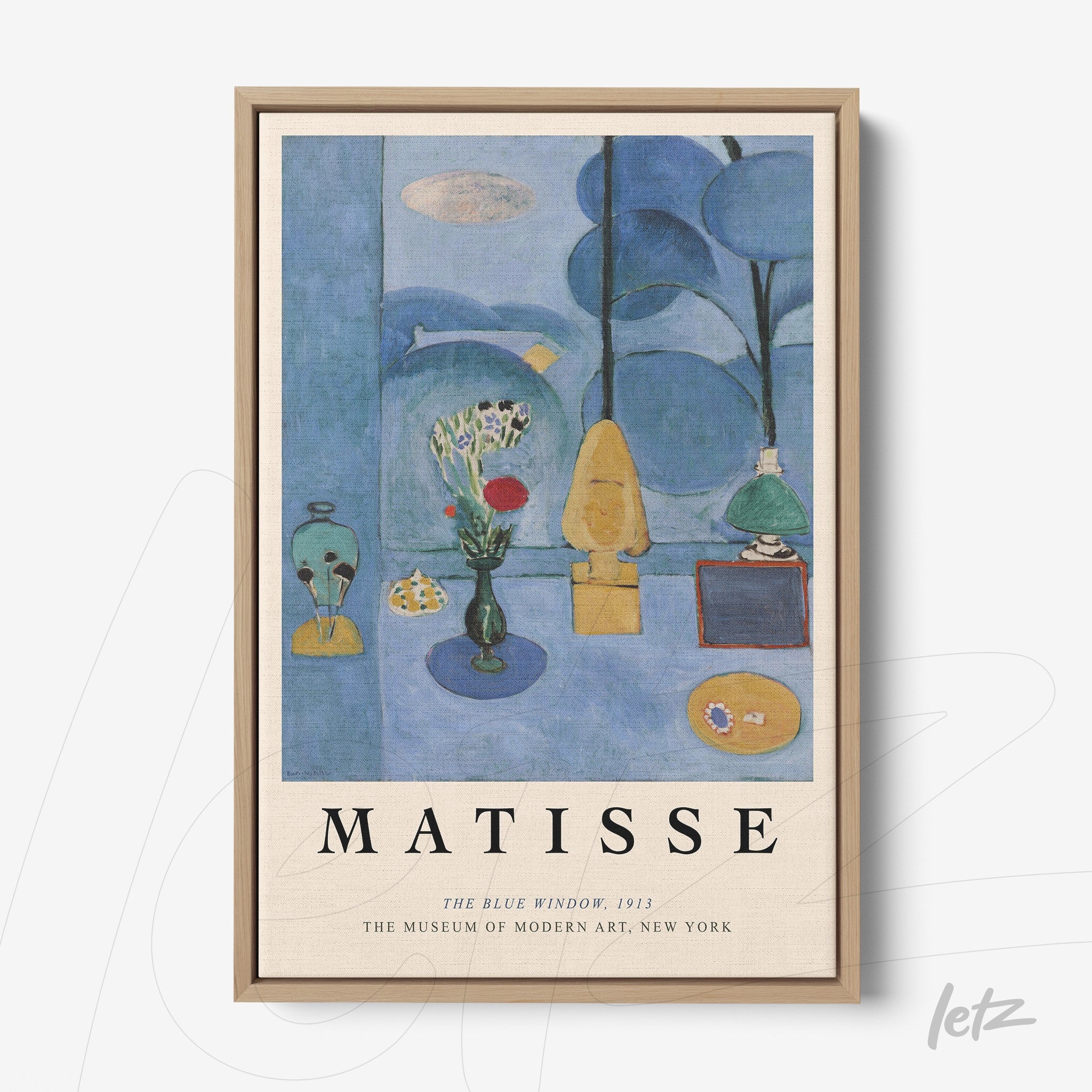 framed modern art by Matisse featuring a blue background with decorative objects and a flower arrangement