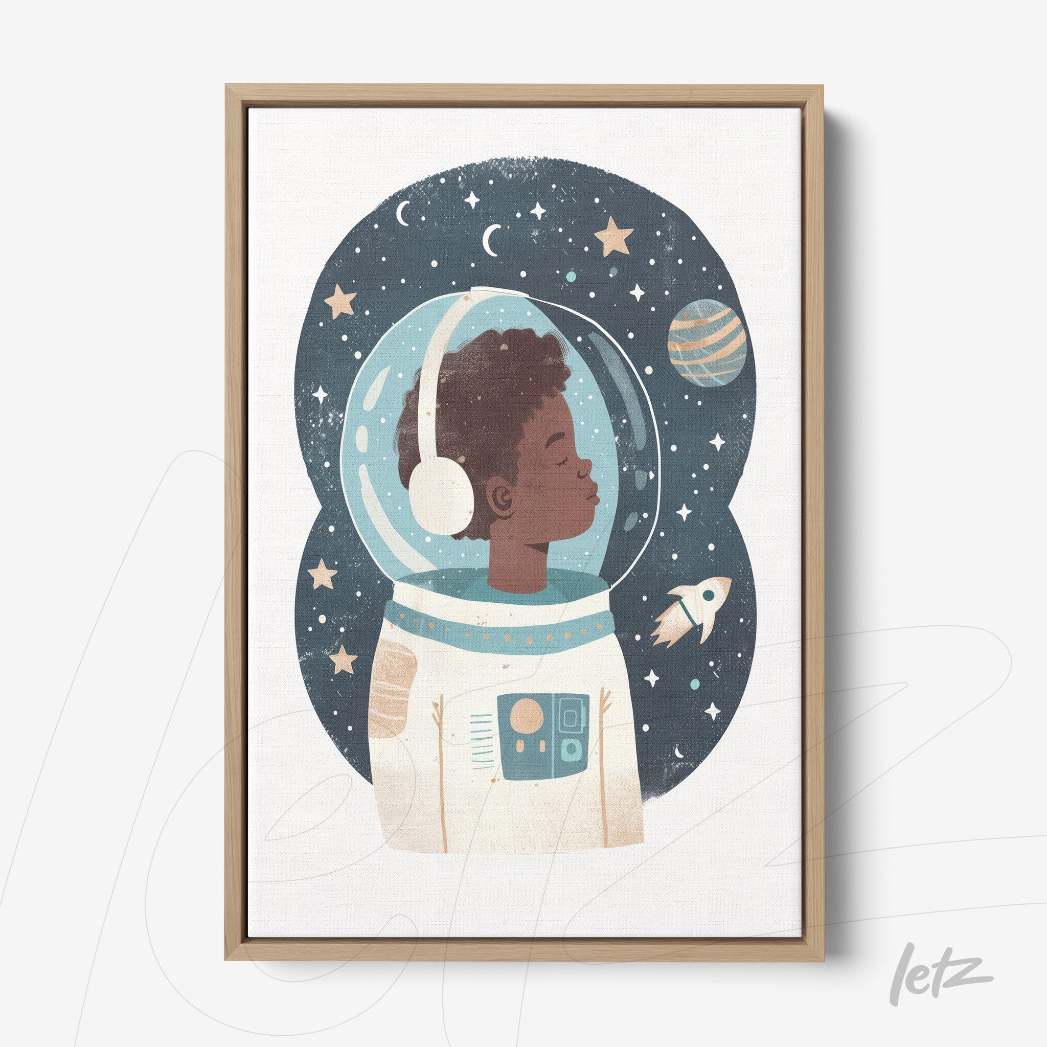 framed artwork of a young astronaut boy in a space suit with a starry background and planet, light wood frame