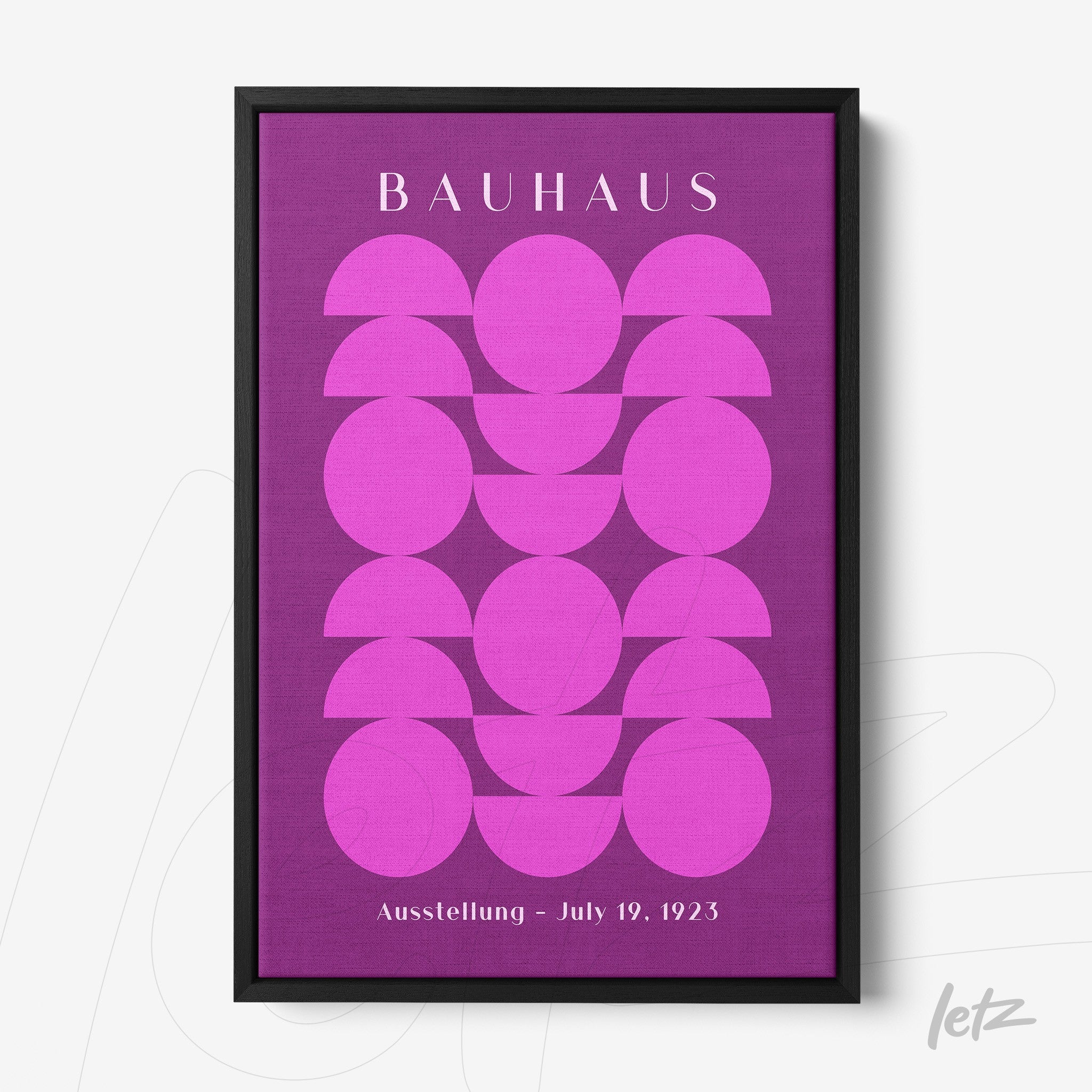 poster featuring geometric art of pink circles on a purple background in a black frame