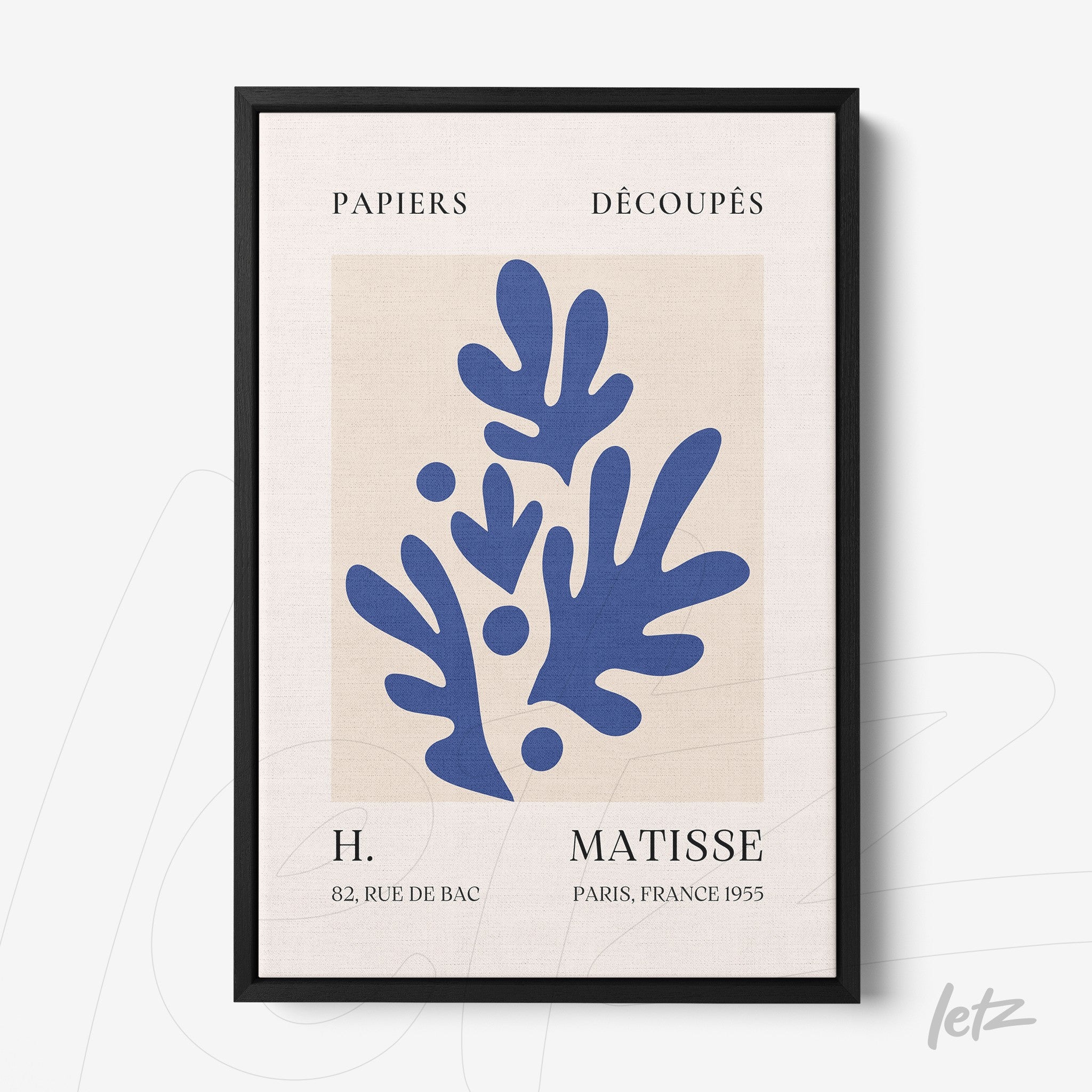 framed decorative art featuring organic shapes in blue tones against a neutral background