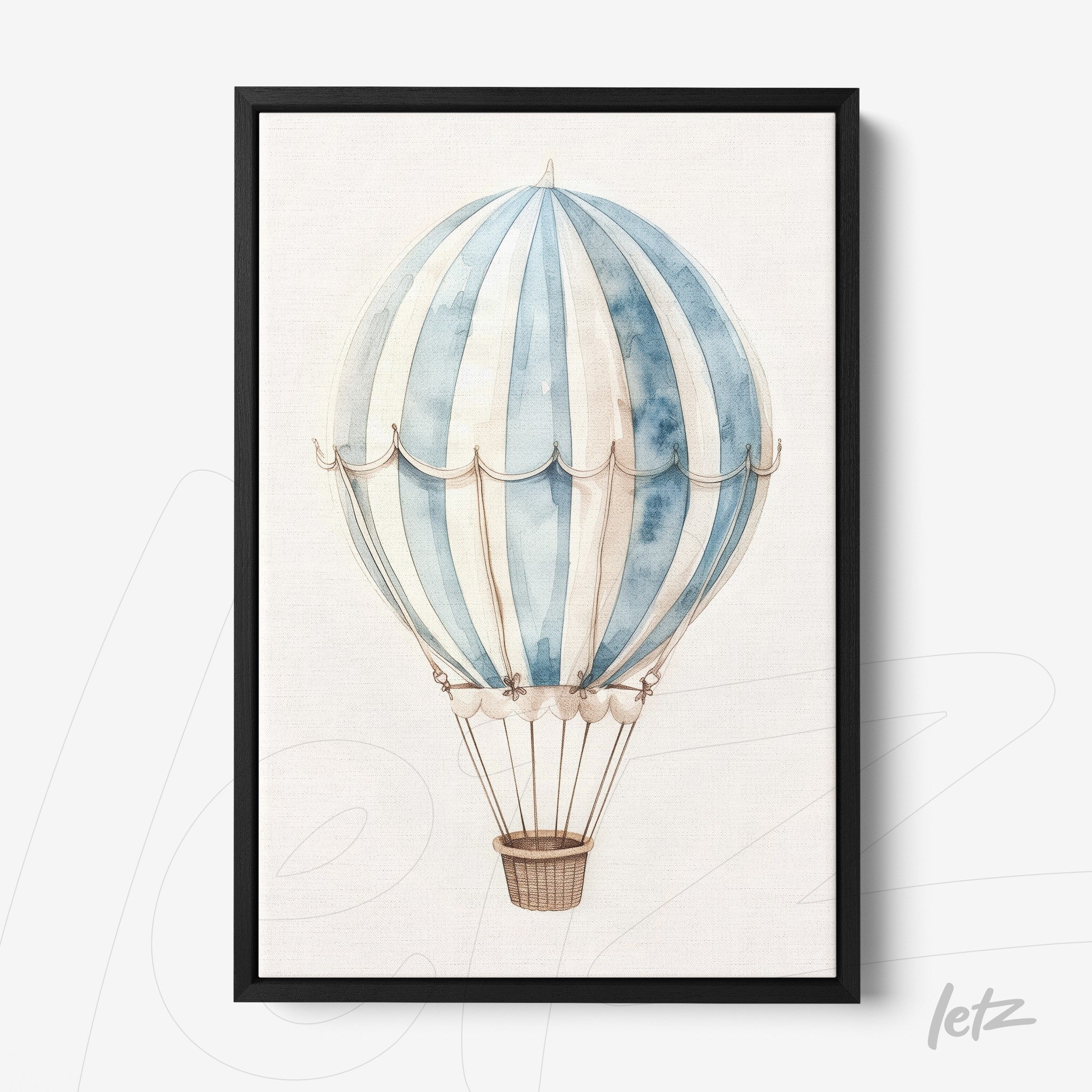 framed wall art featuring a hot air balloon in shades of blue with a black frame