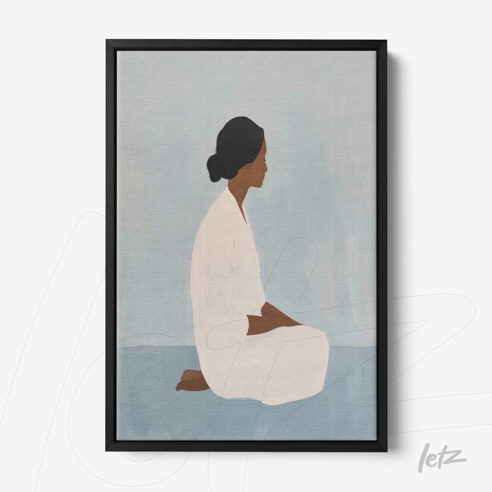framed abstract art of a female figure in a meditation pose with a black frame