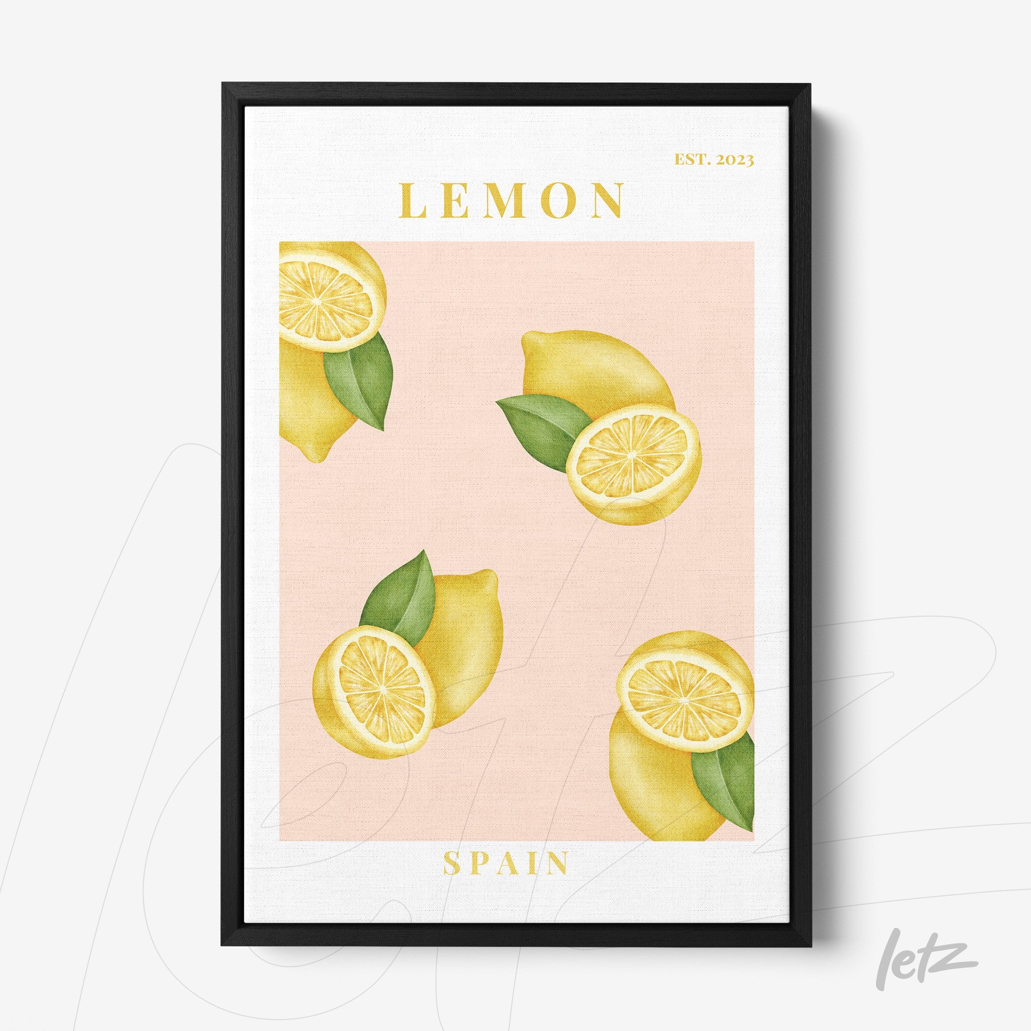 framed art featuring lemons on a pink background with a thin black frame
