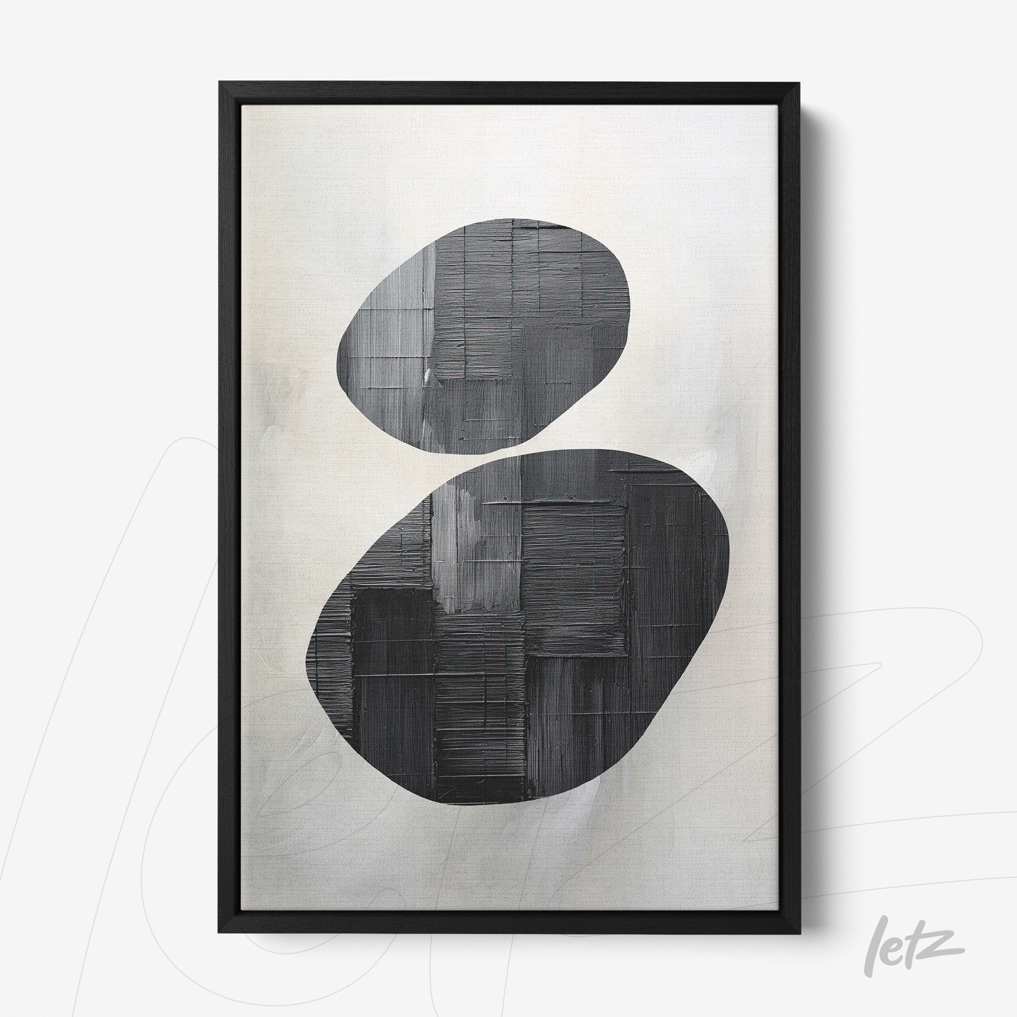 abstract wall art in black and white with a thin black frame