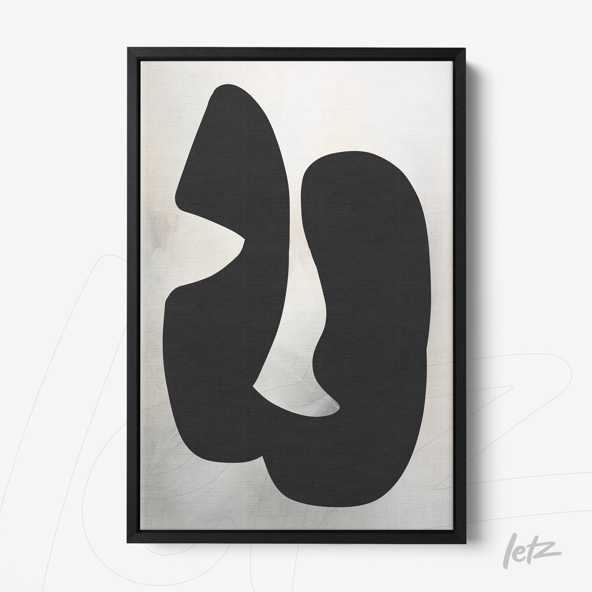 framed abstract wall art in black and white with black frame