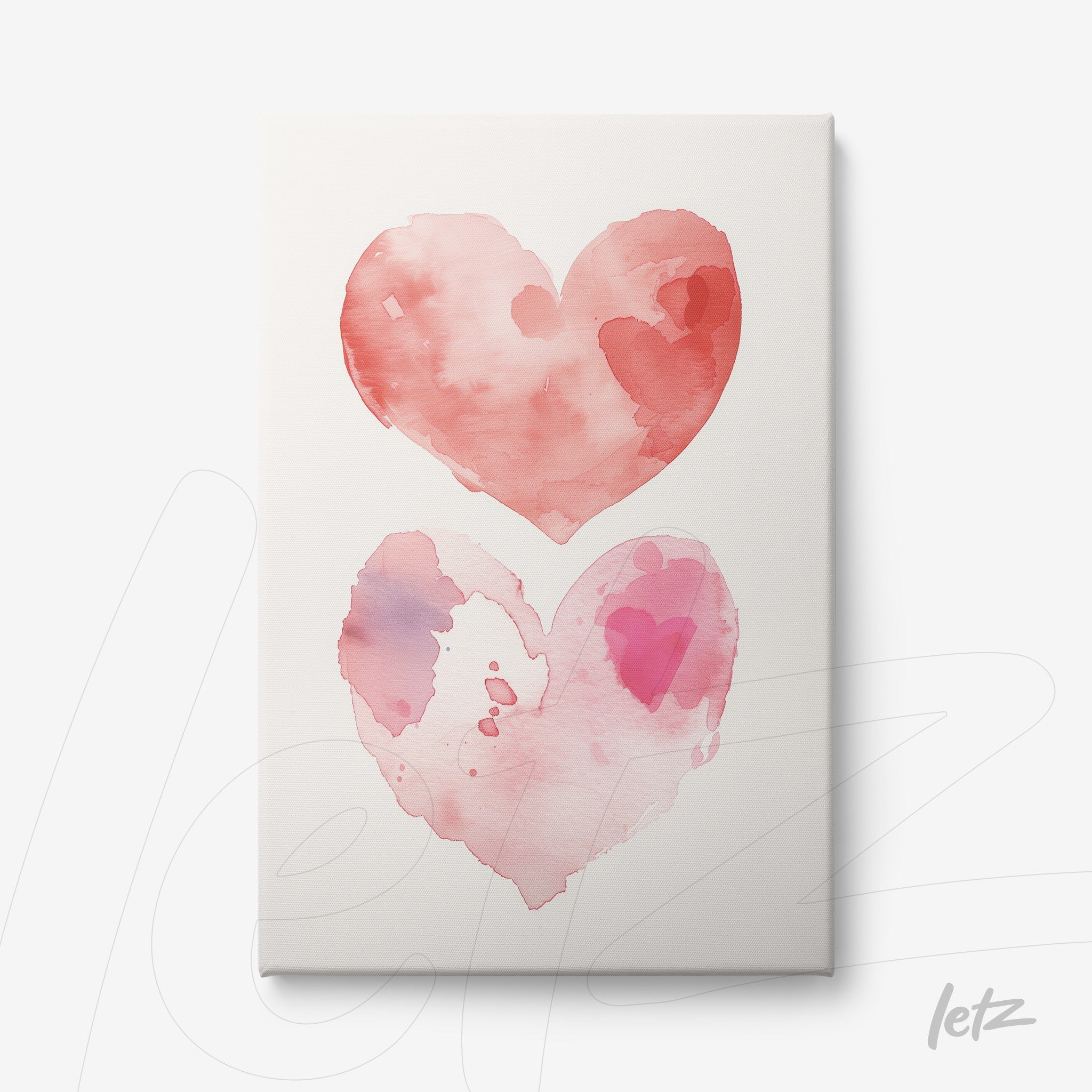 canvas print featuring watercolor hearts in shades of red and pink on a light background
