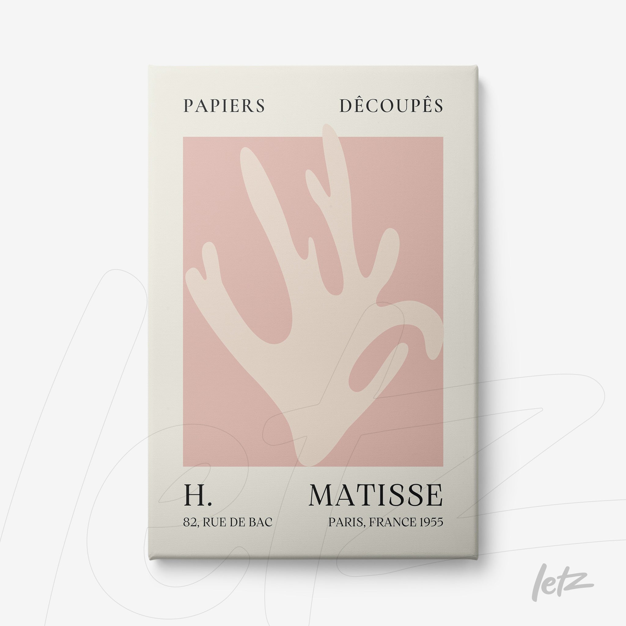 framed modern art of a stylized hand on pink background with white frame
