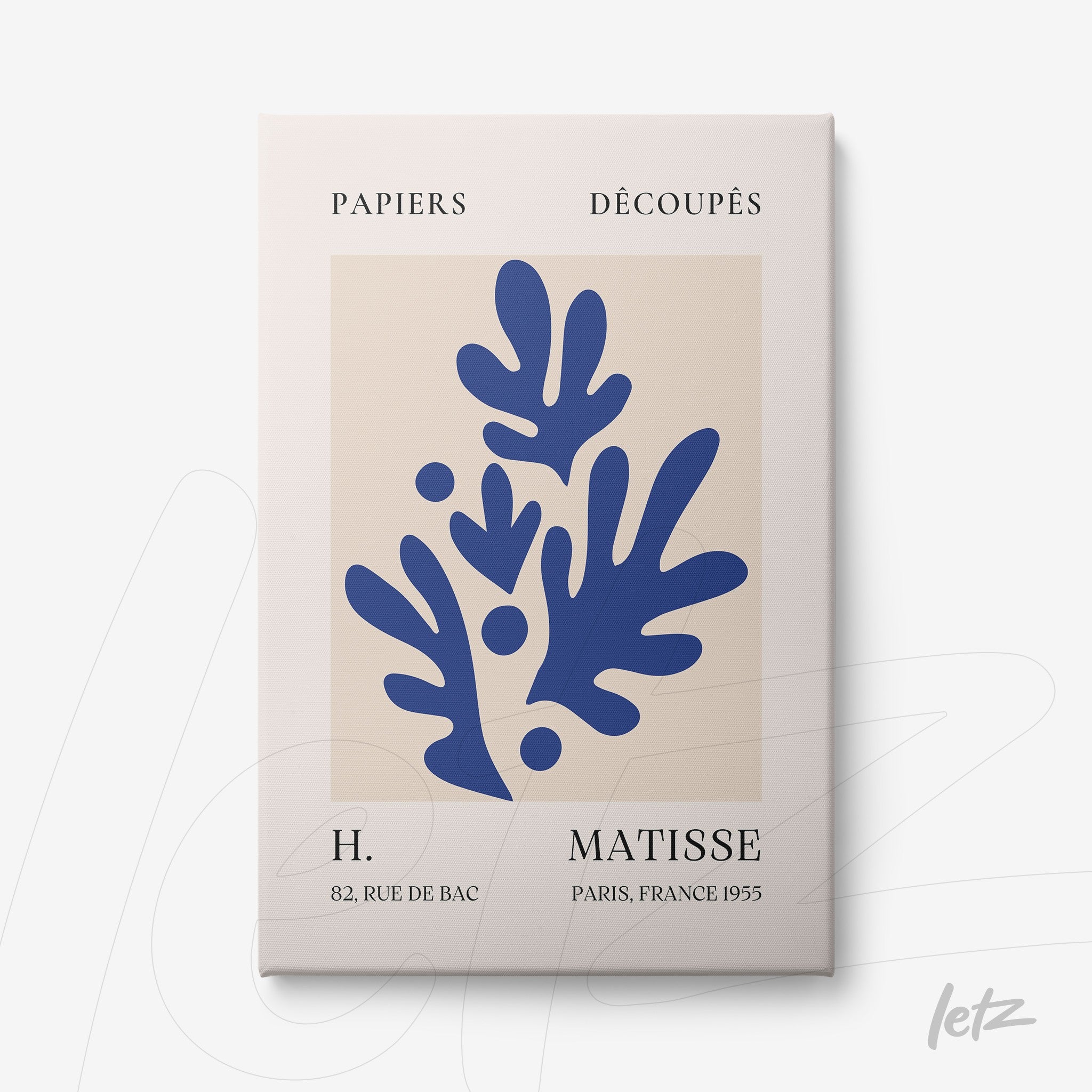 modern artwork featuring blue organic shapes on a beige background with a light frame