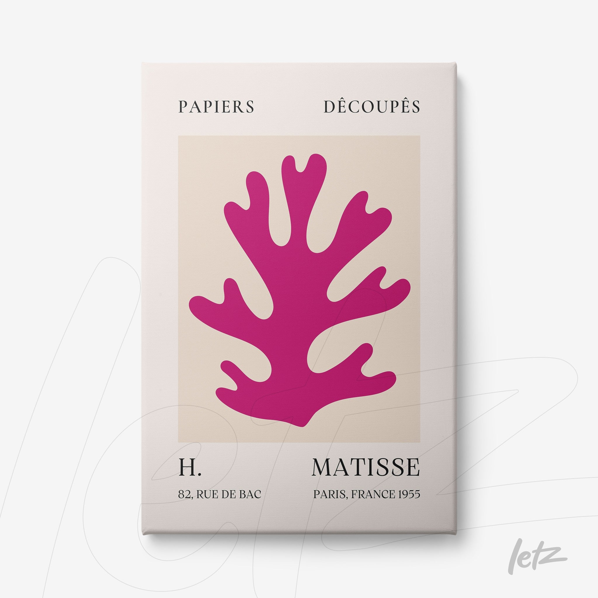 framed art print of a pink paper cut-out coral shape on cream background with white frame