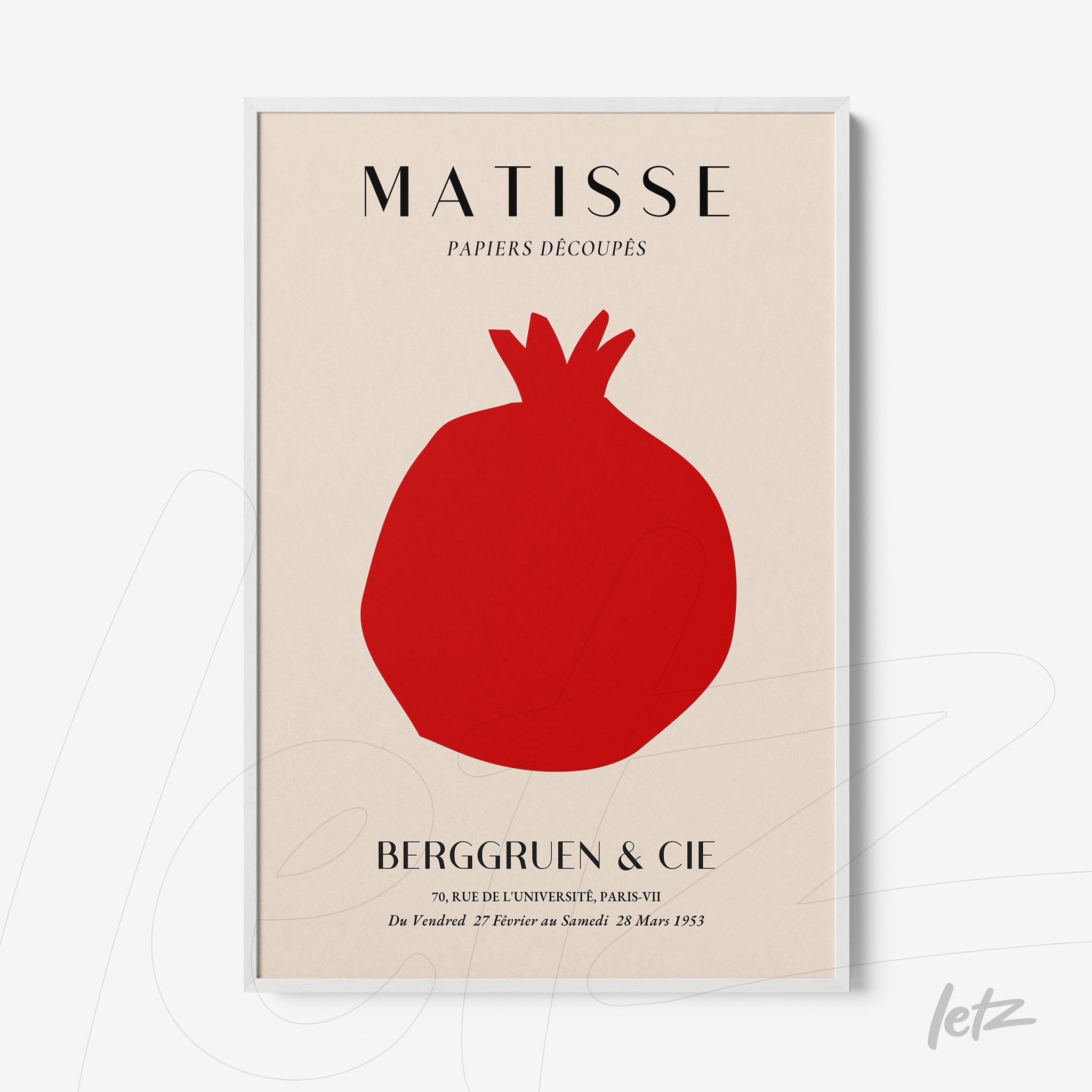 framed modern art featuring a red pomegranate silhouette on a cream background with a sleek white frame