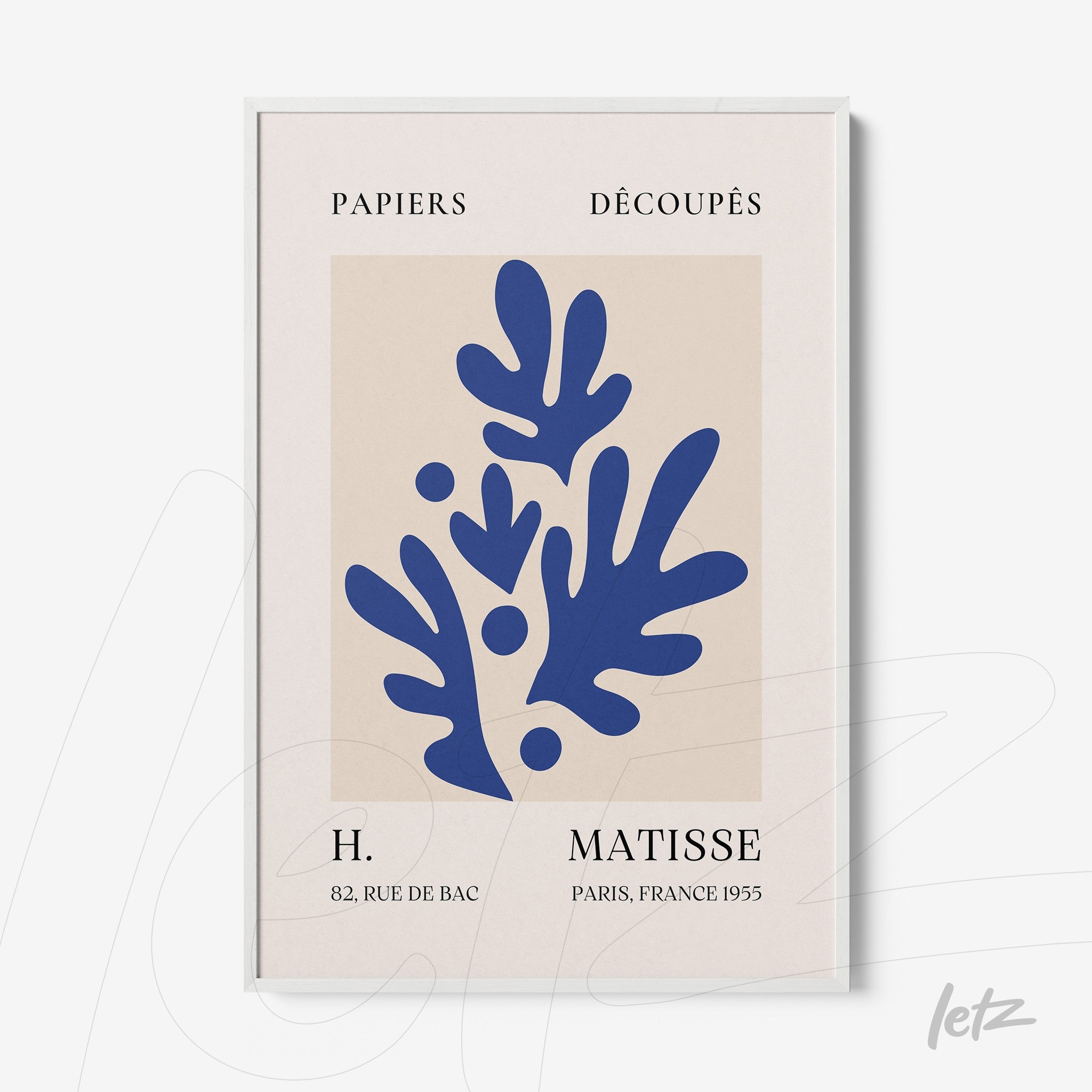 framed wall art featuring blue cut-out shapes on a light background, inspired by Matisse's abstract style