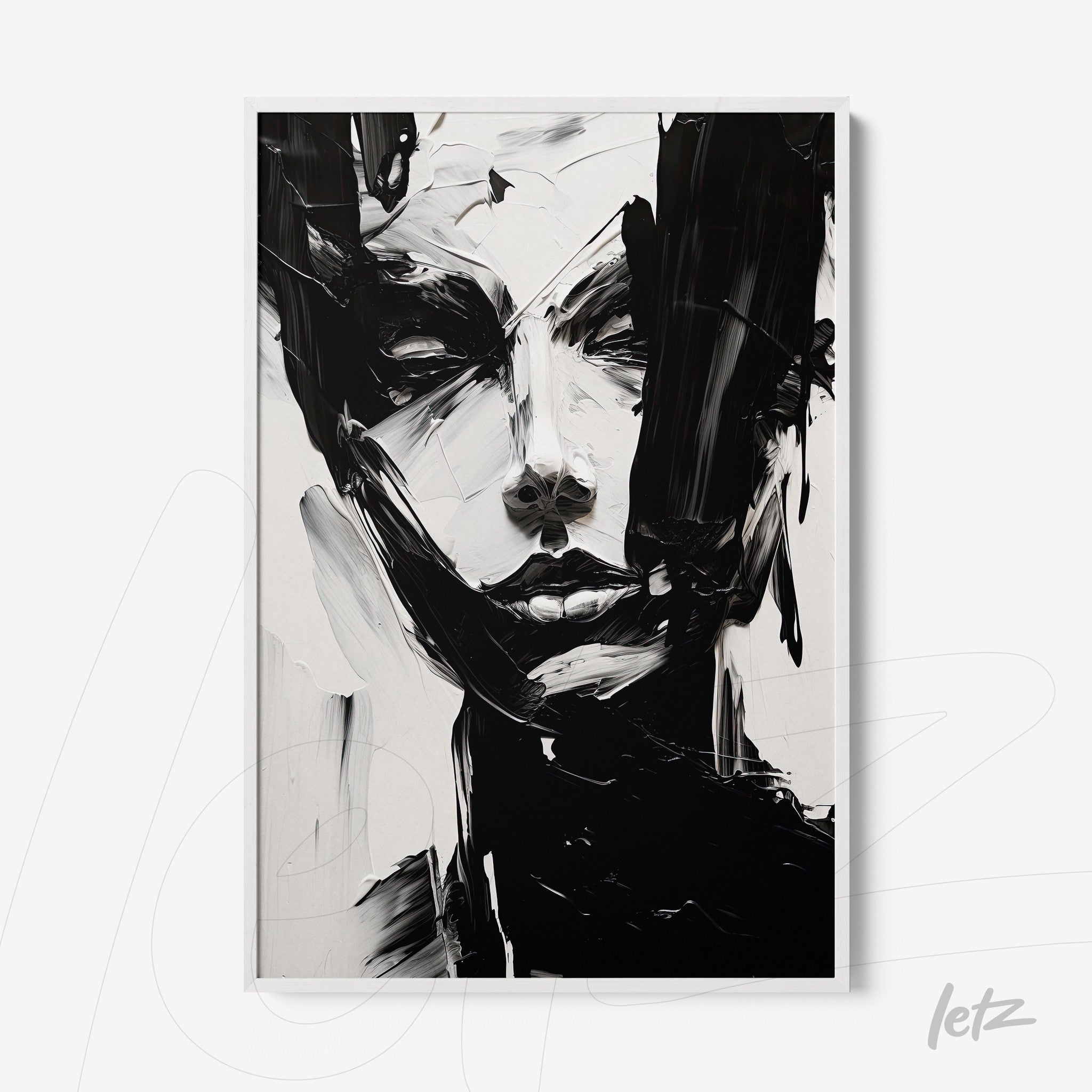 abstract wall art in black and white depicting a human face surrounded by expressive brushstrokes on a neutral background