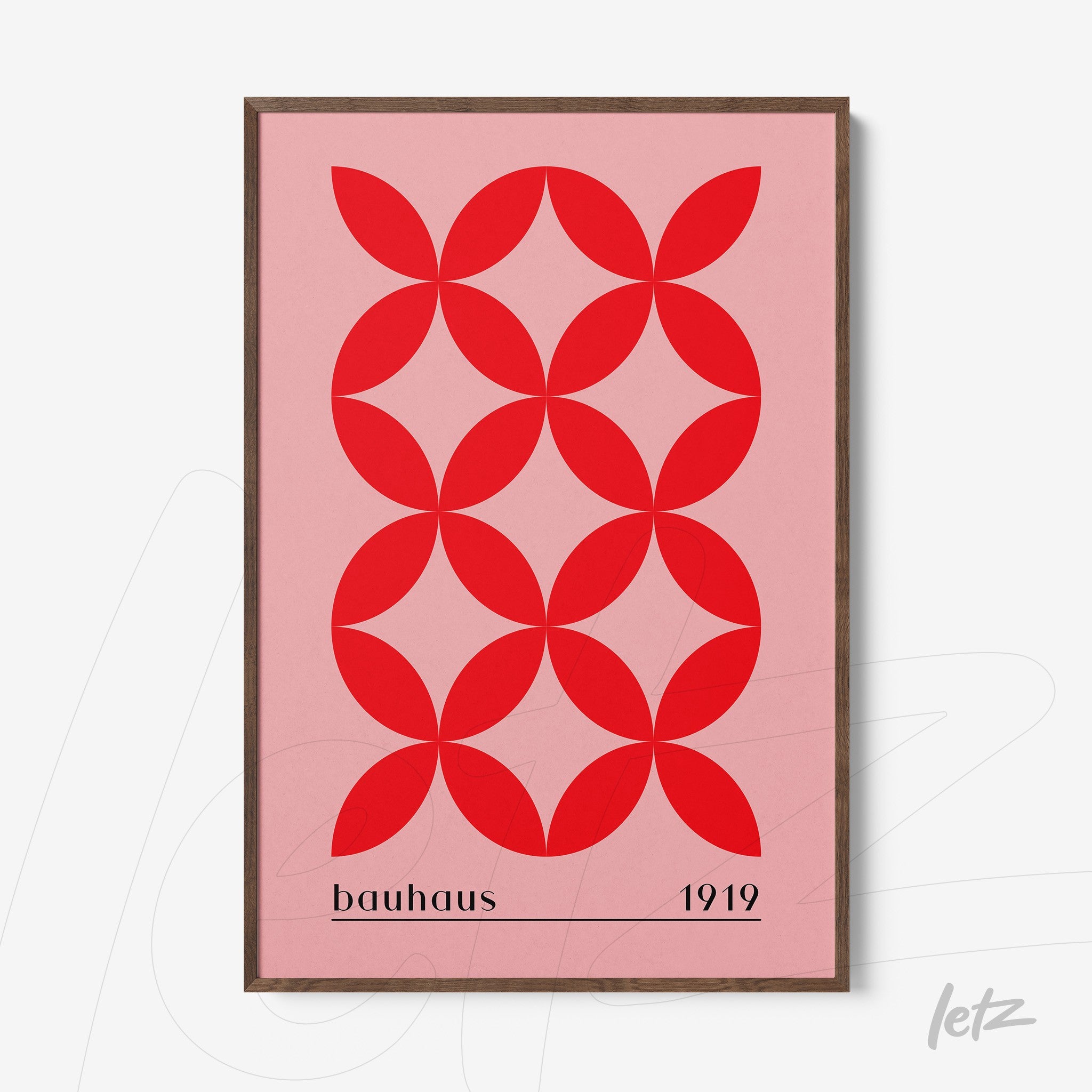 canvas print featuring red geometric pattern in bauhaus style with dark wooden frame
