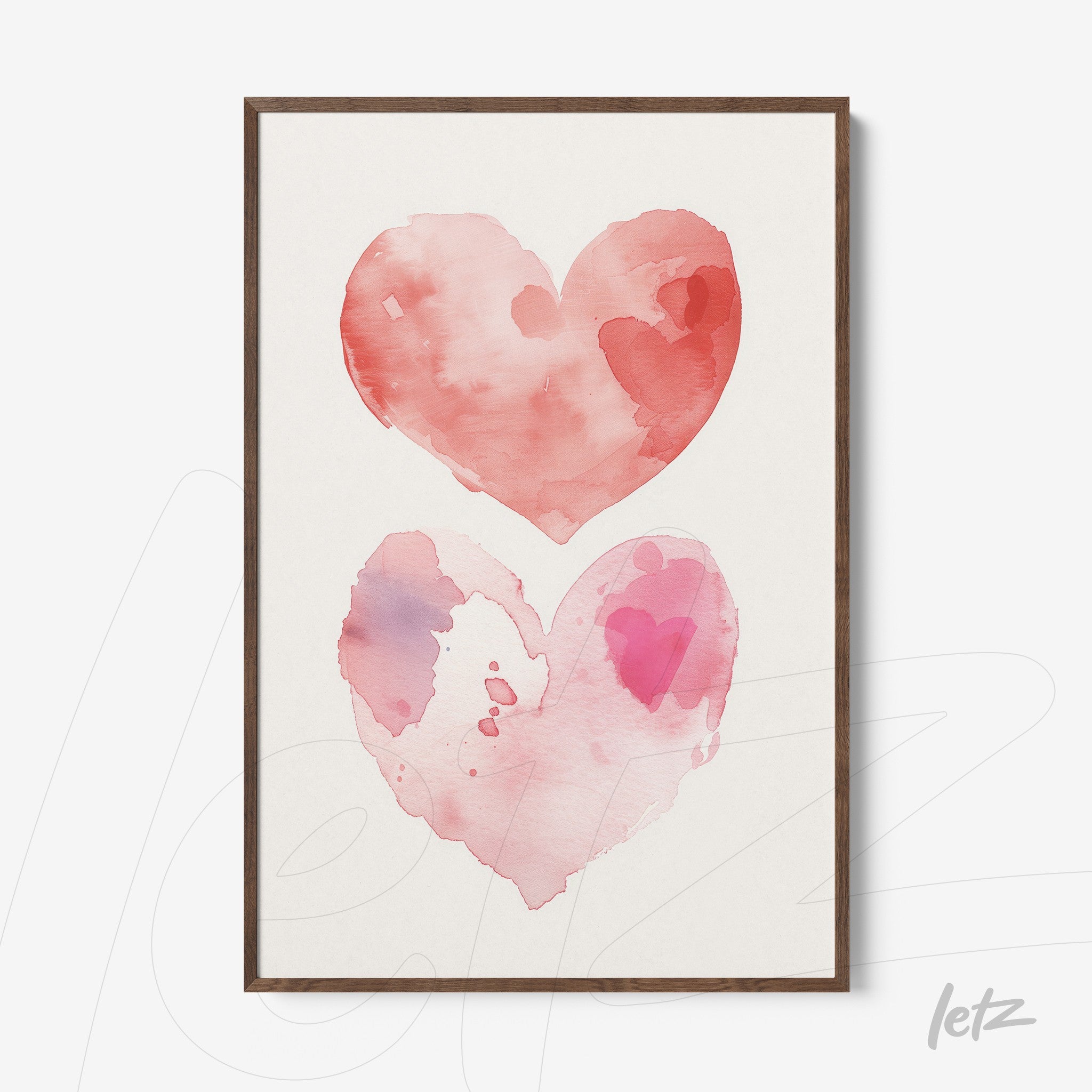framed art print featuring watercolor illustrations of hearts in shades of pink and red with a light wood frame