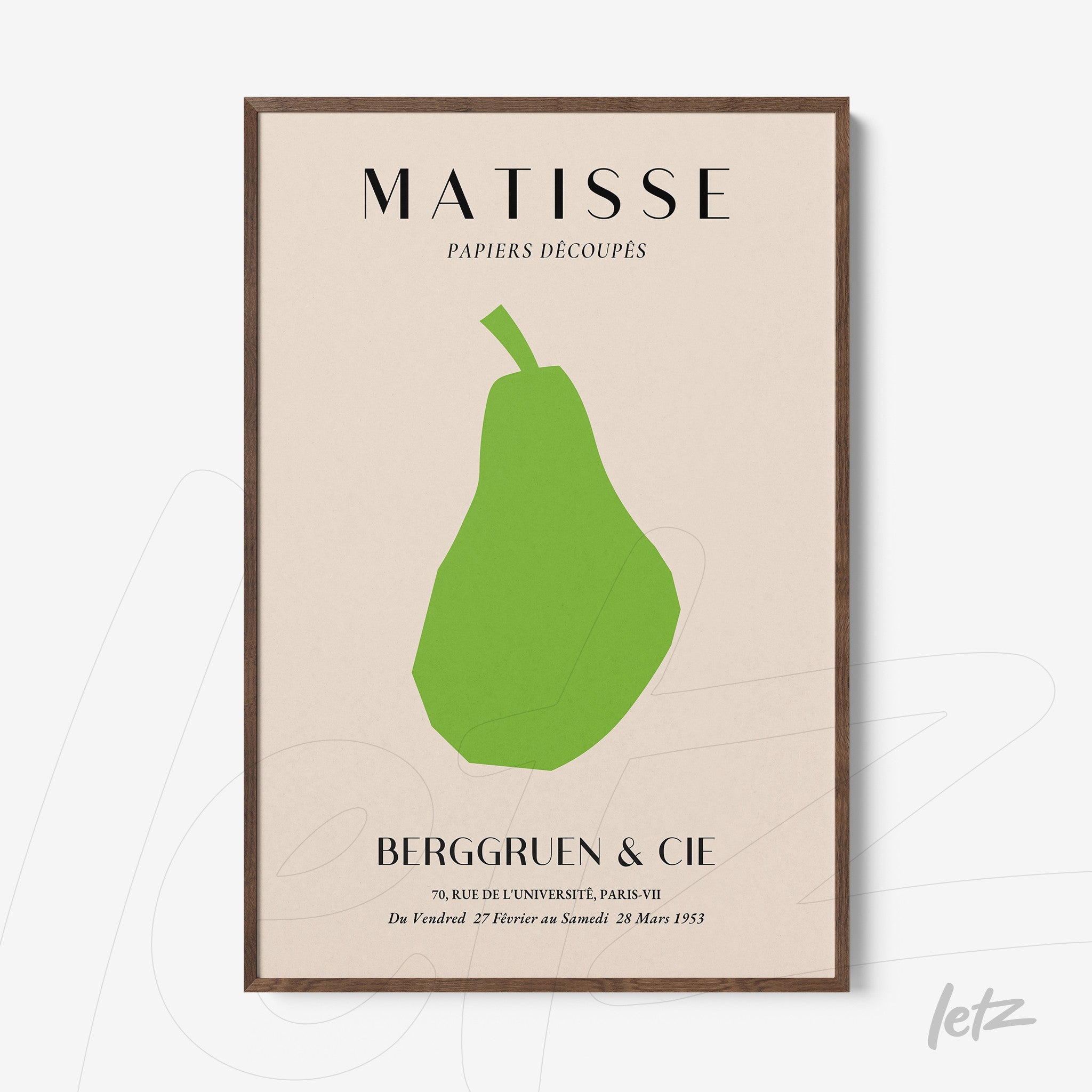 framed wall art featuring a minimalist green pear on light background with dark wooden frame