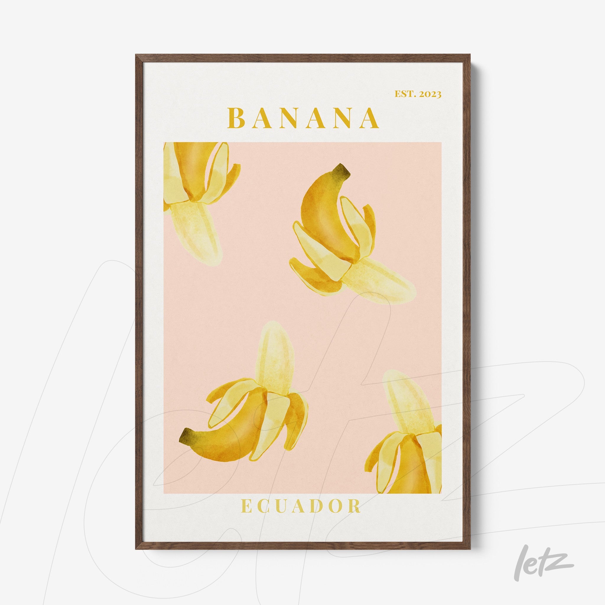 framed art print featuring yellow bananas on a light pink background with yellow text stating 'BANANA' and 'ECUADOR'
