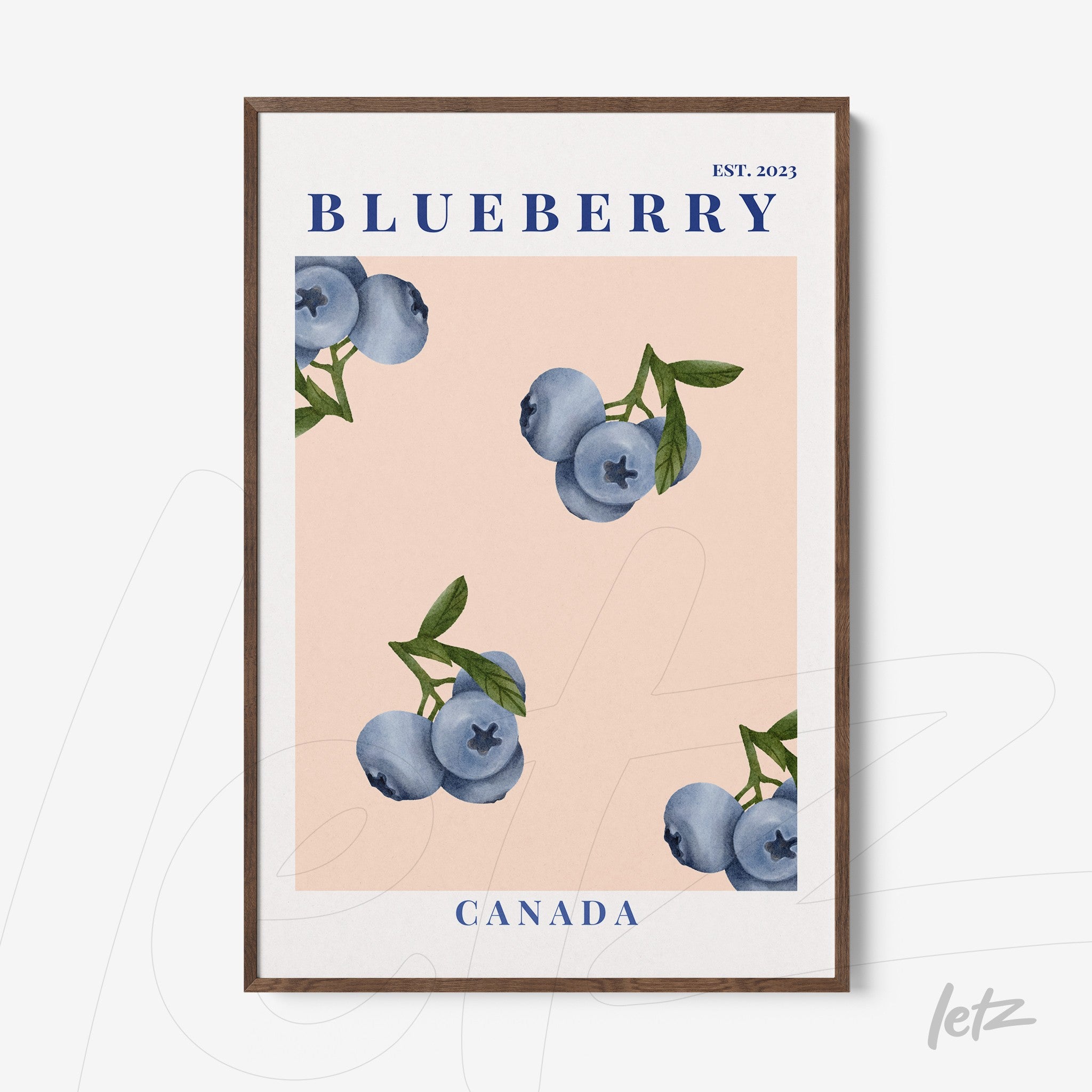 framed wall art featuring watercolor blueberries on a pink background with a dark wood frame