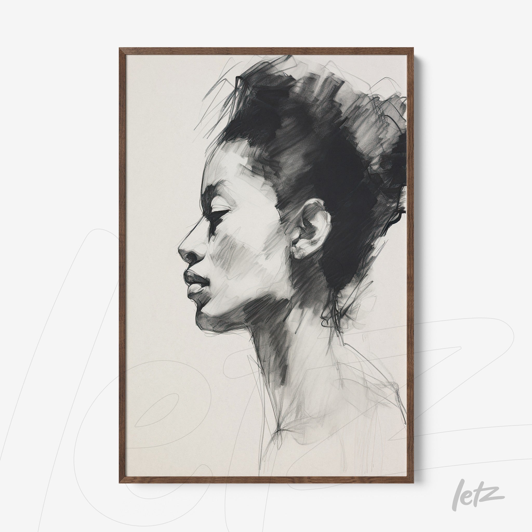 framed wall art featuring a monochromatic profile portrait of a woman in dark wooden frame