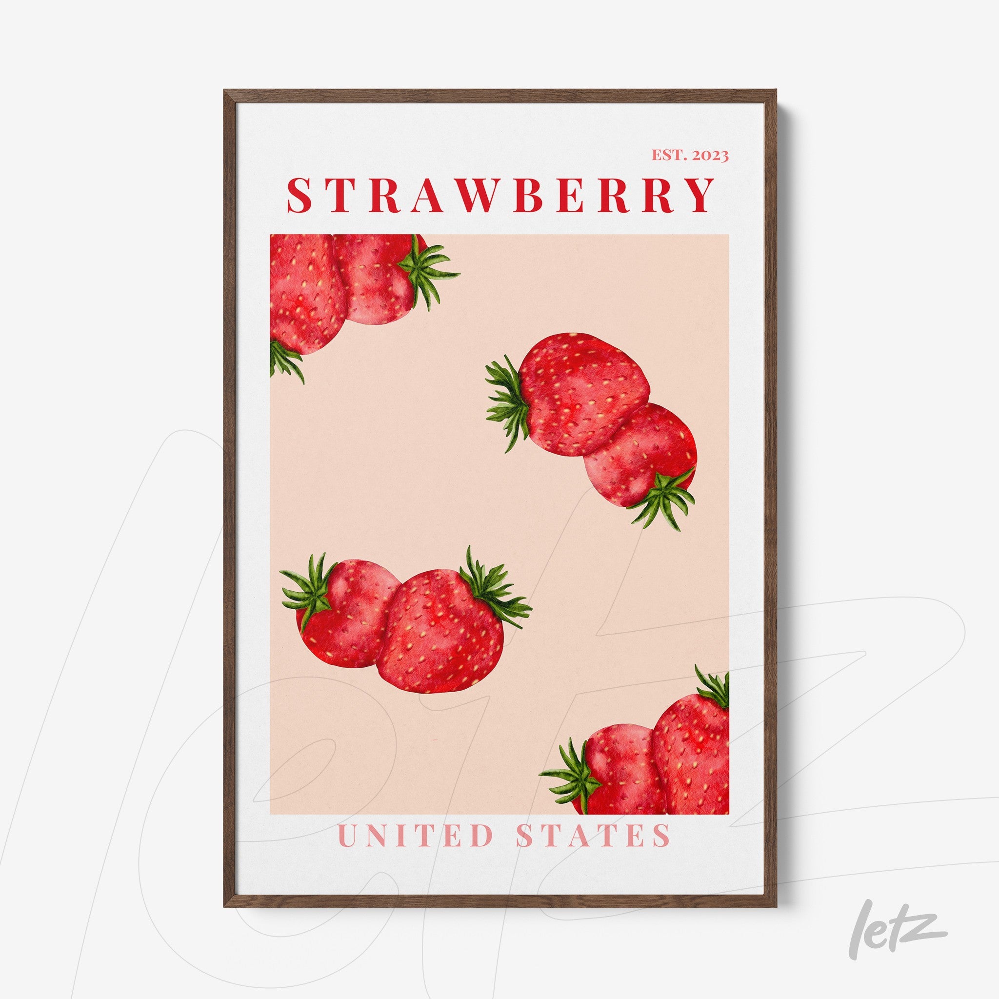 framed art print featuring illustrated strawberries on a light pink background with a dark wood frame