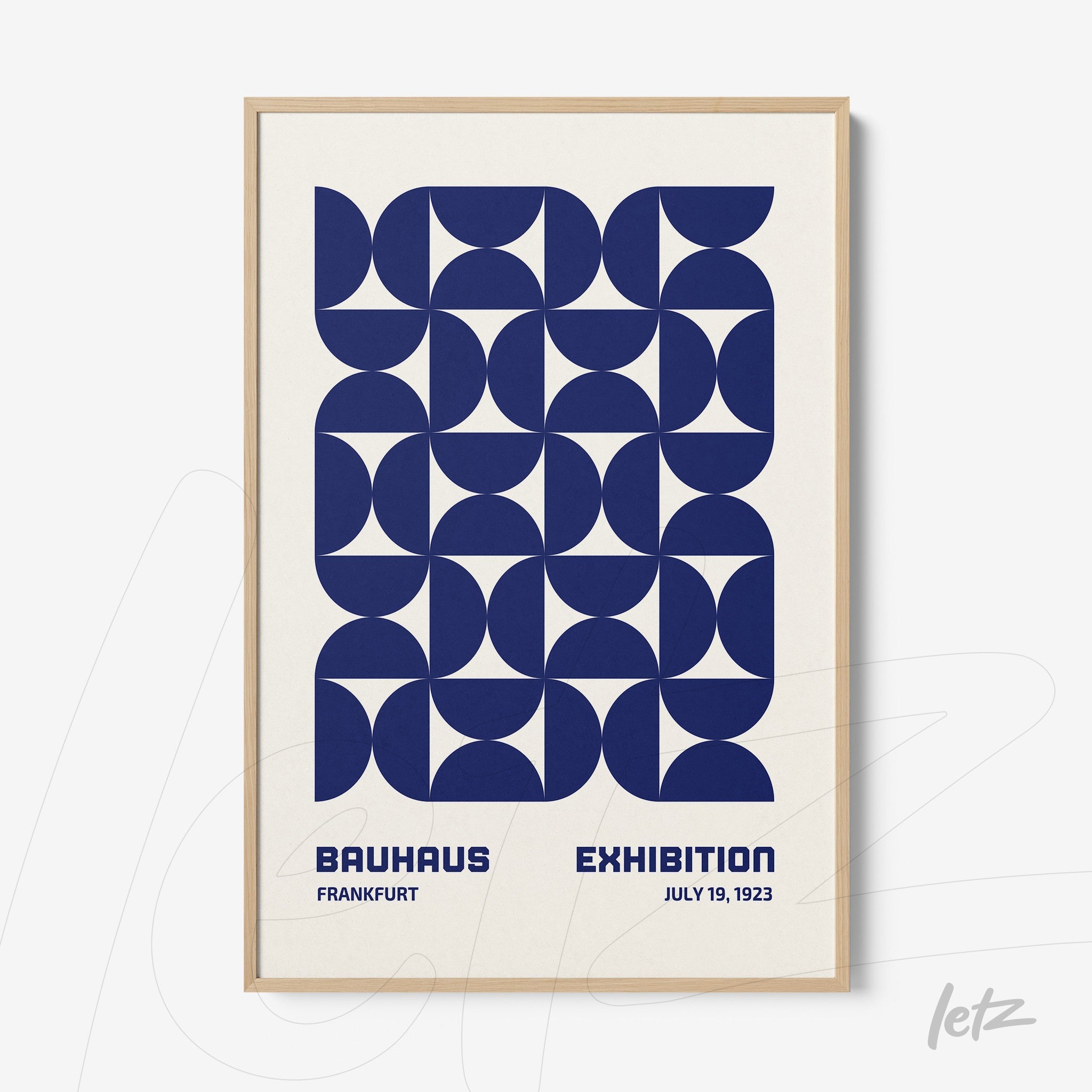 bauhaus exhibition poster in frankfurt featuring geometric blue design in natural frame
