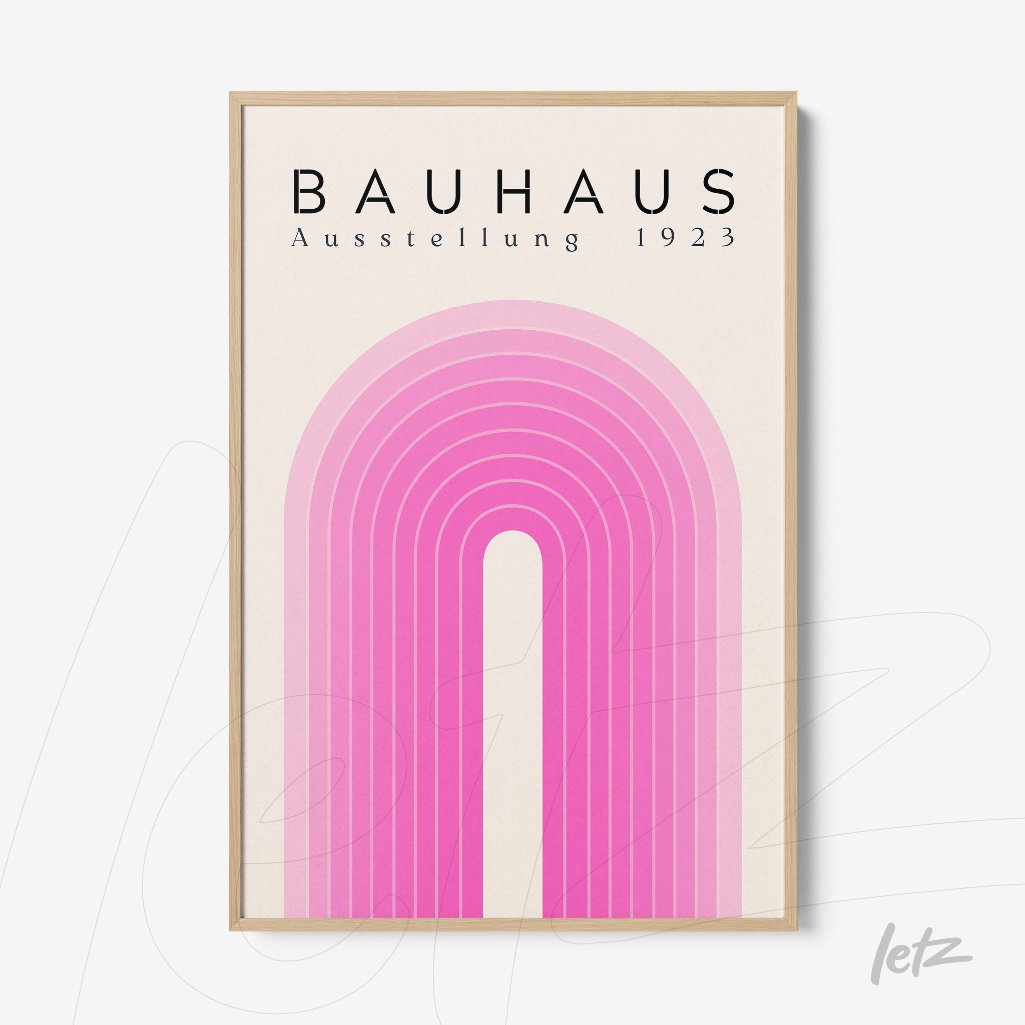poster print bauhaus with pink concentric arches framed in light wood