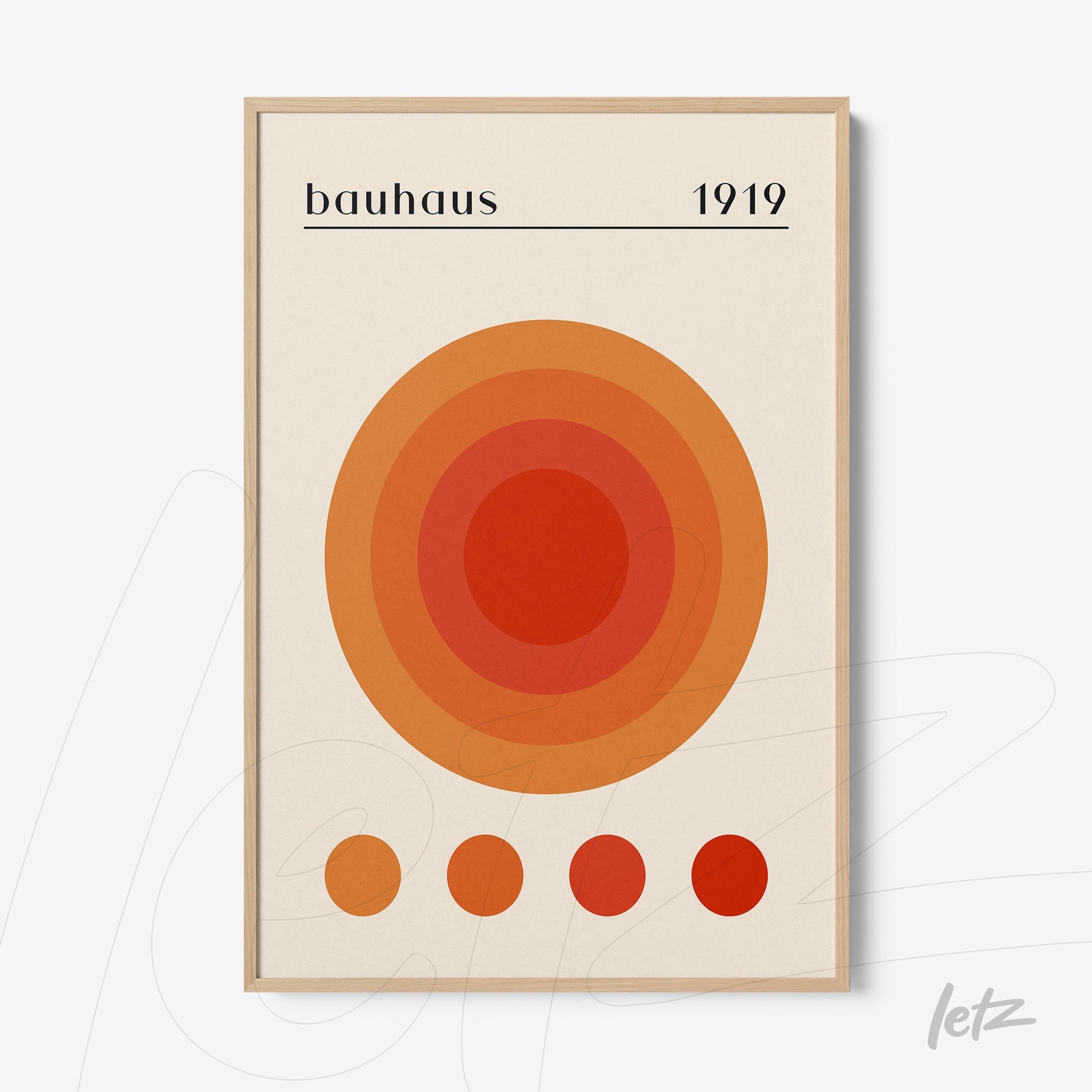printed bauhaus poster with orange concentric circles on light frame