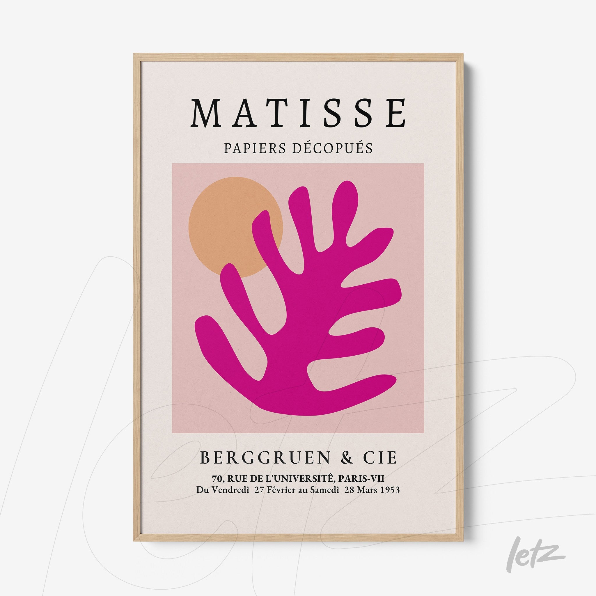 framed abstract artwork featuring pink leaf shapes on a light background with a light wood frame