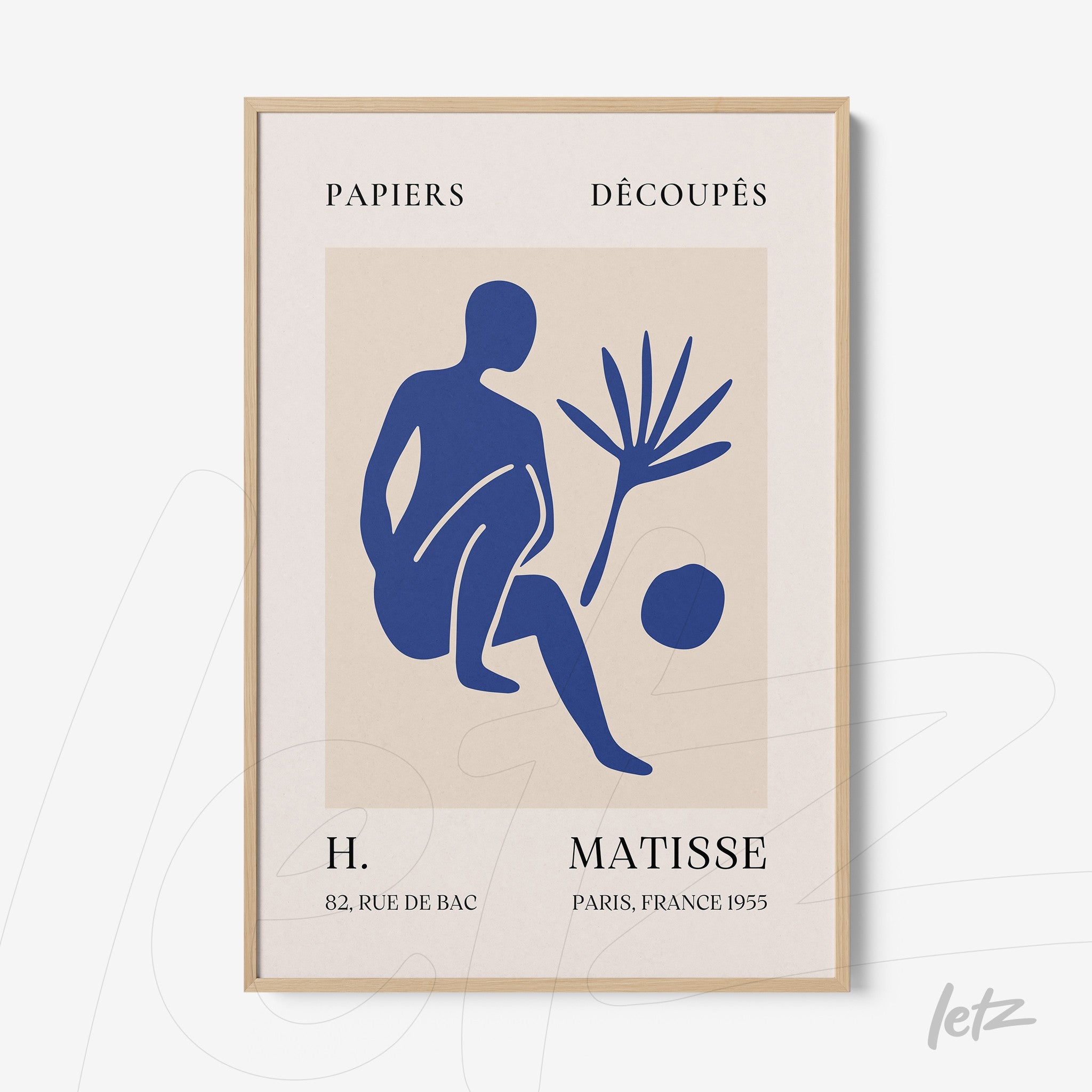 framed modern art featuring a blue human figure and a plant, with a light wood frame