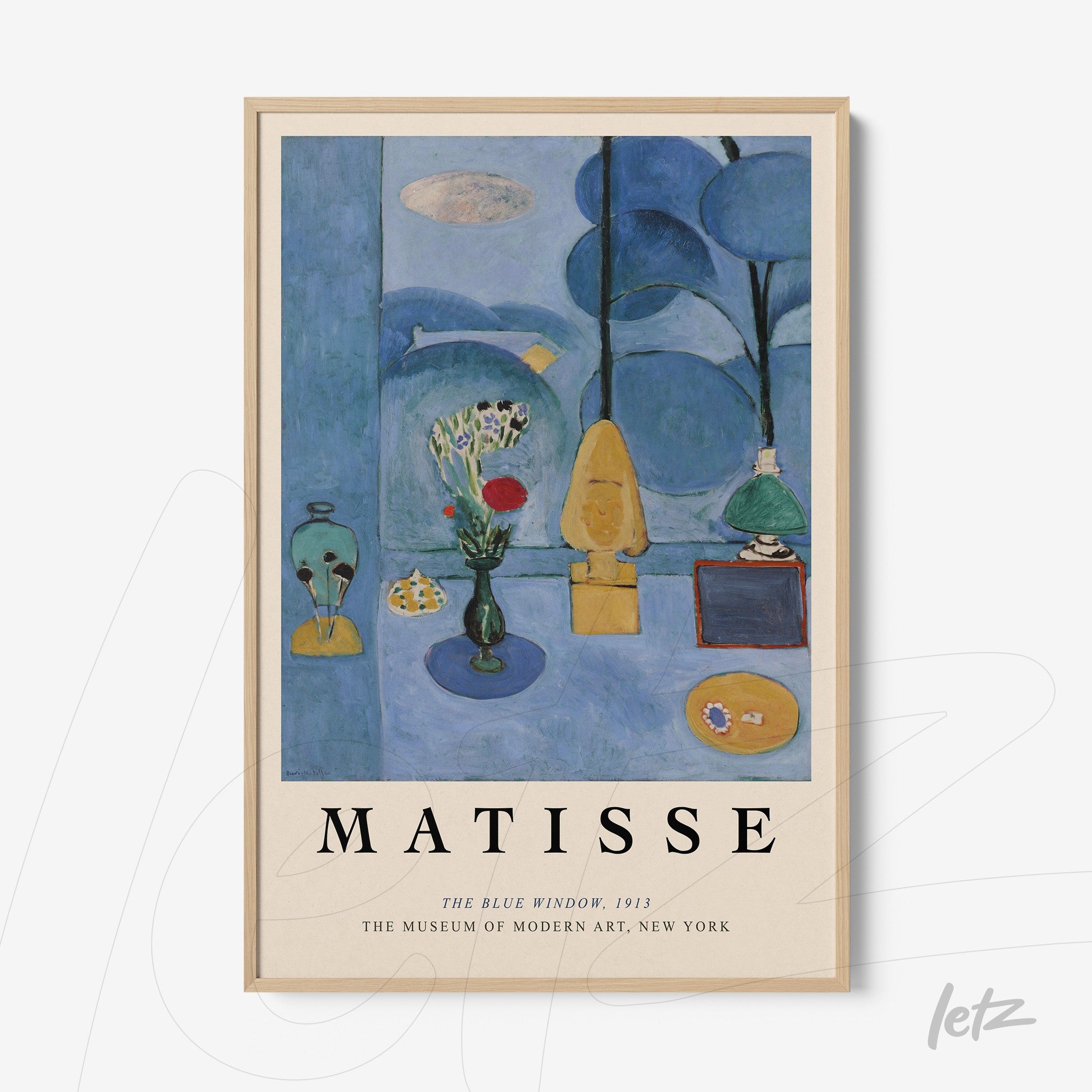 framed art piece of Matisse depicting a blue window with decorative elements in blue background