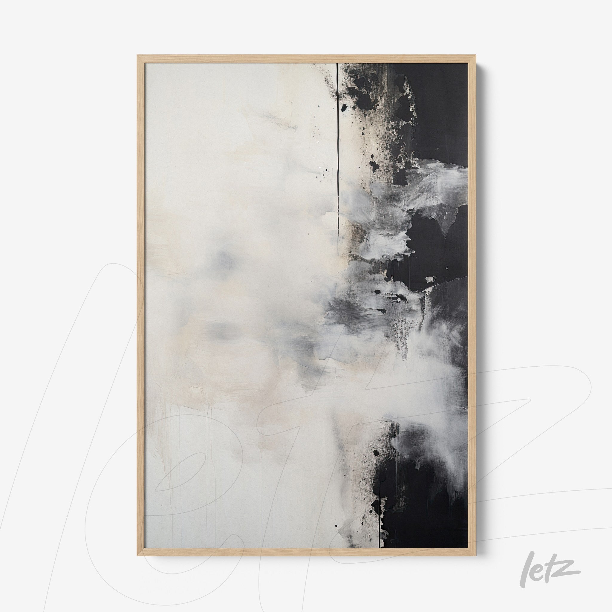 abstract wall art in black and white with light wood frame
