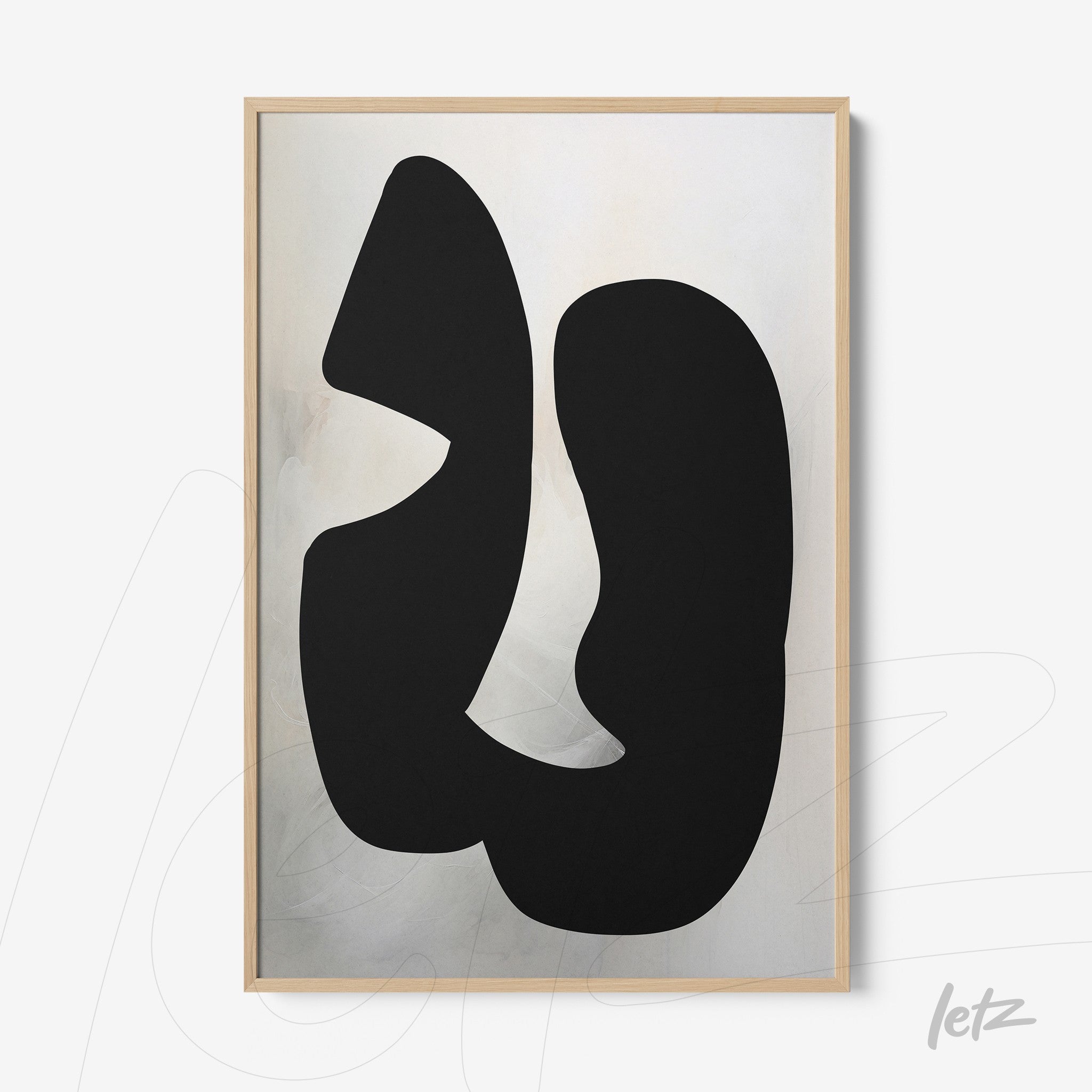 abstract art piece in black on light background with light wood frame