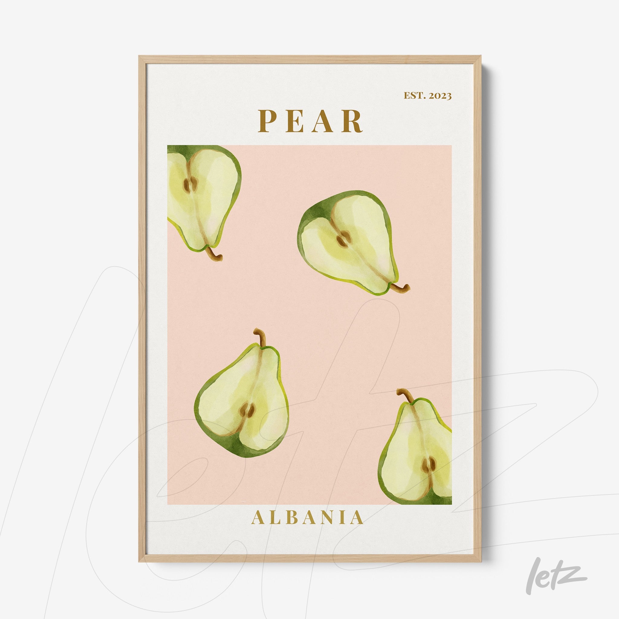 framed art featuring illustrated pears on a pink background with light frame