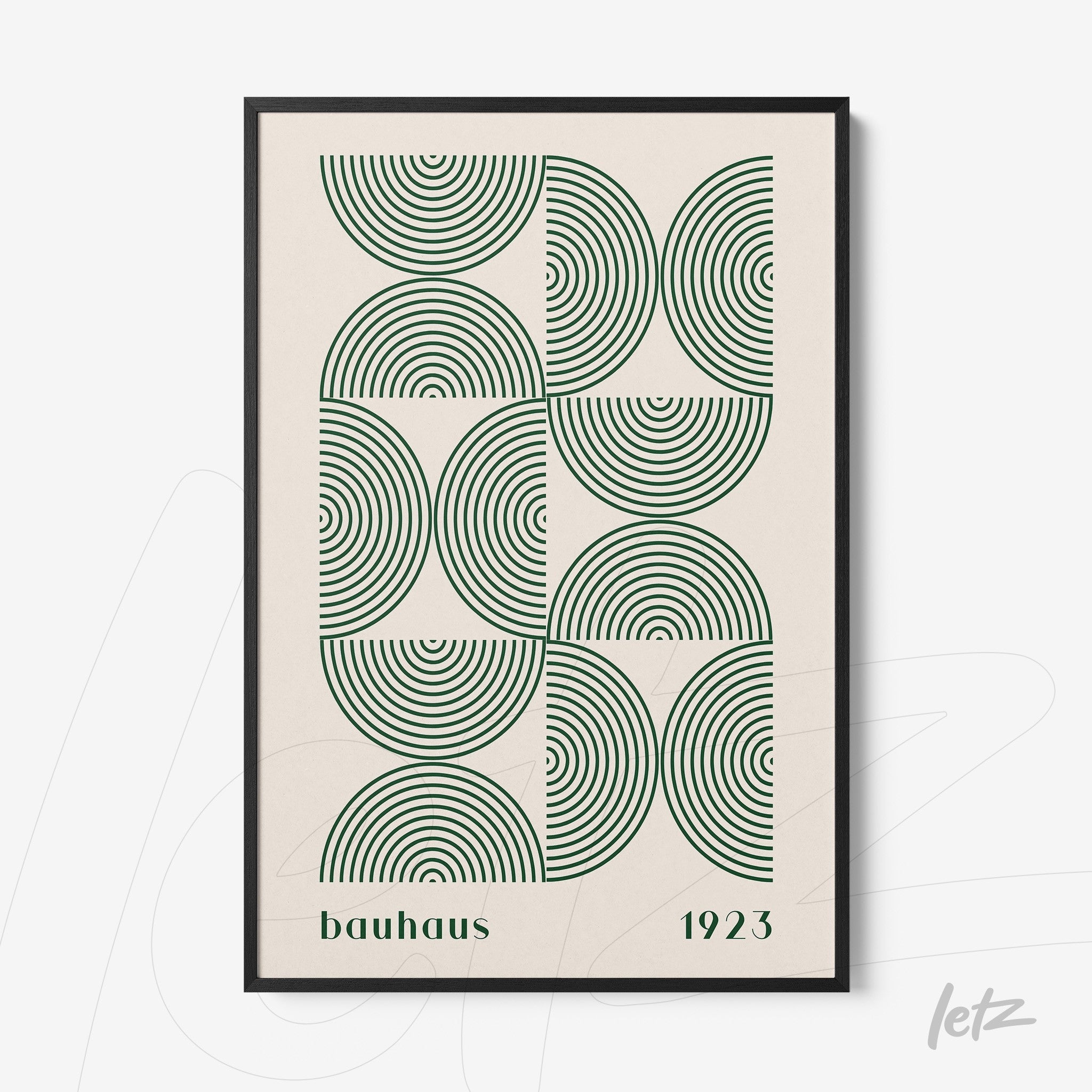 framed wall art featuring green concentric circles in Bauhaus style from 1923 with black frame