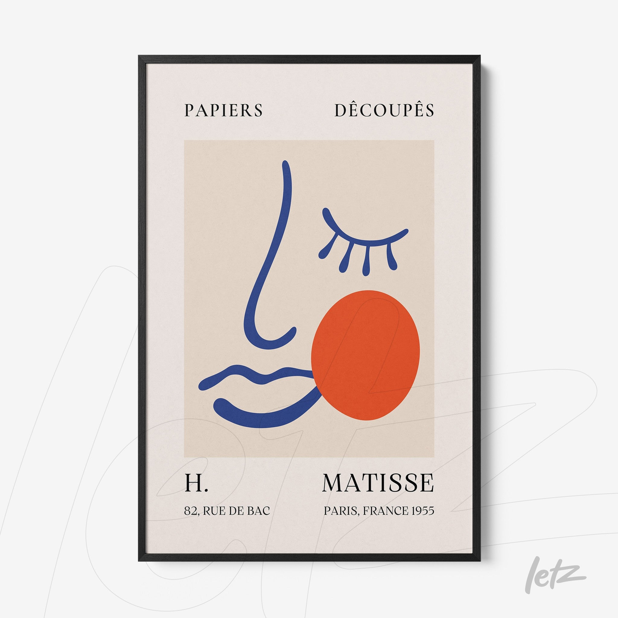 framed modern art of an abstract face design with a black thin frame