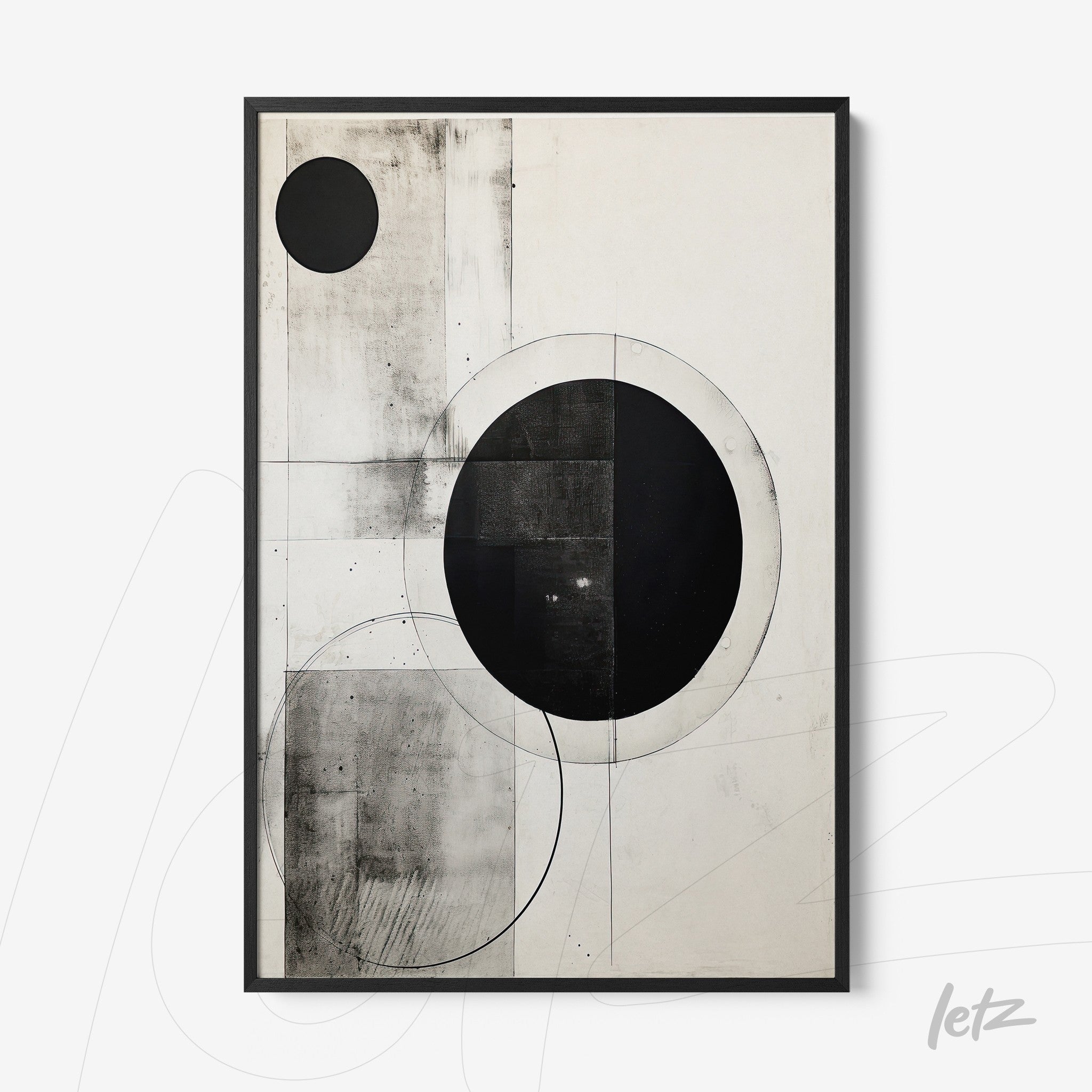 abstract wall art featuring black and white circles in various arrangements framed in black