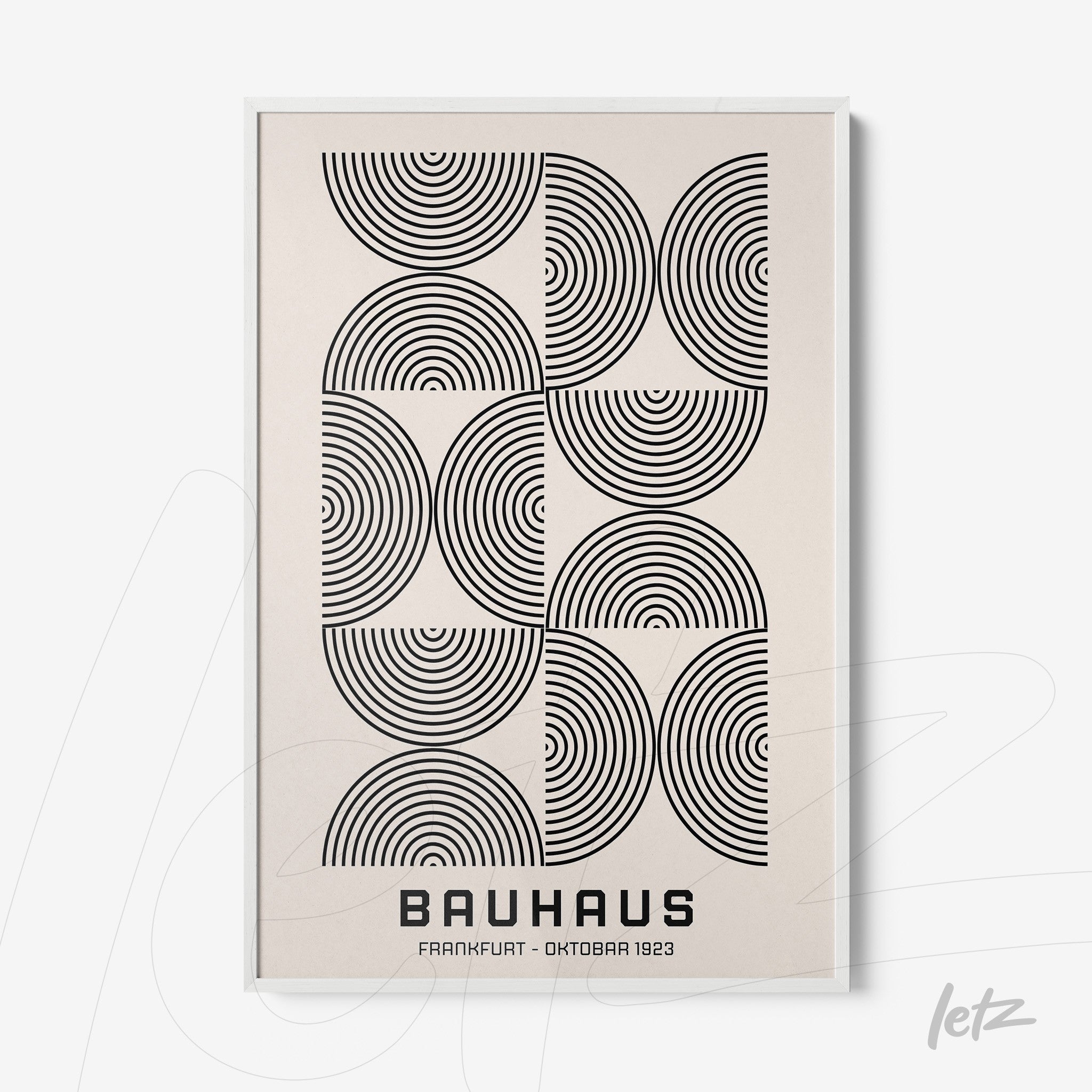 poster with black and white geometric art featuring concentric circles displayed in a white frame